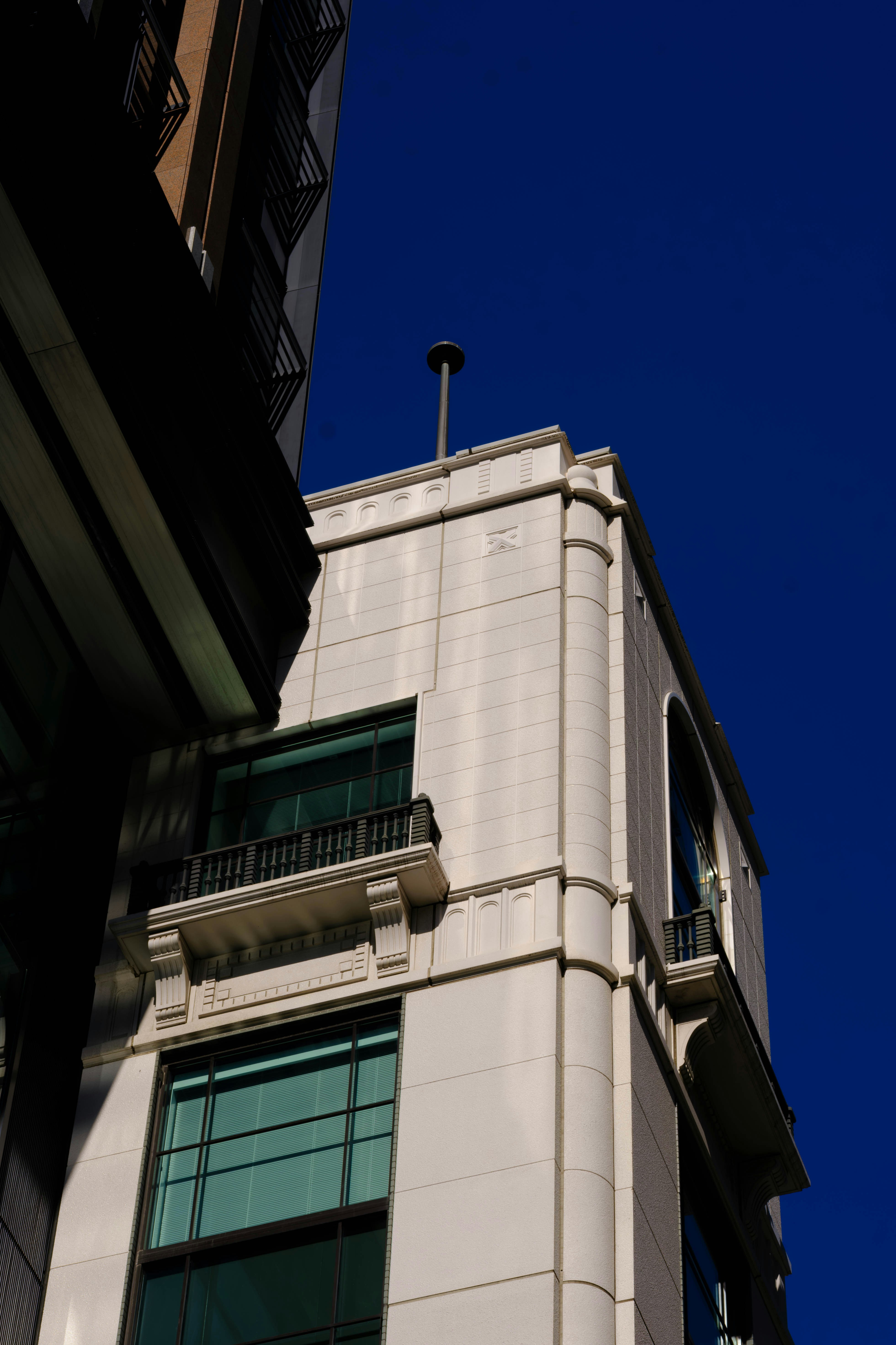 Modern building against a clear blue sky.