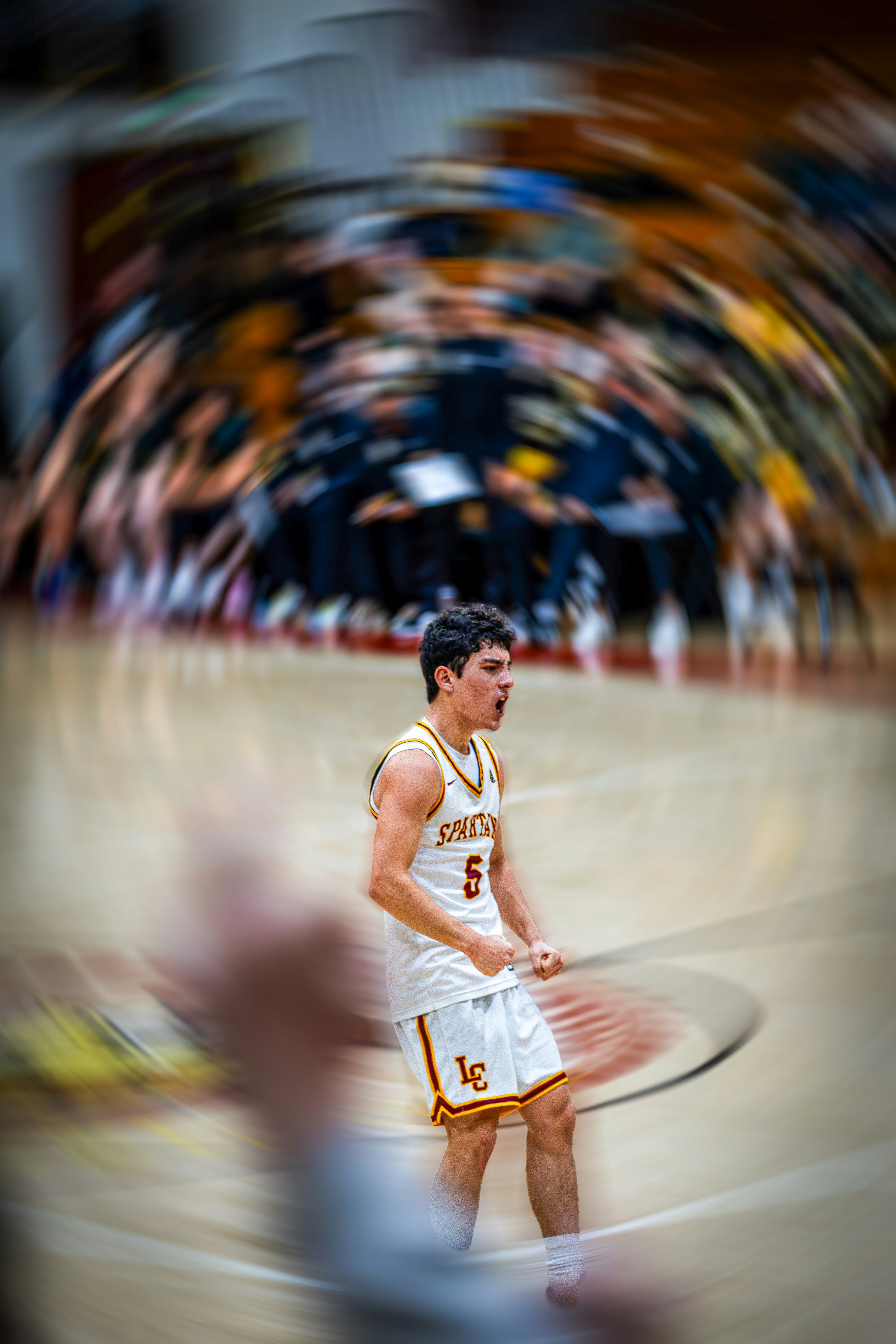 Basketball player celebrating on the court