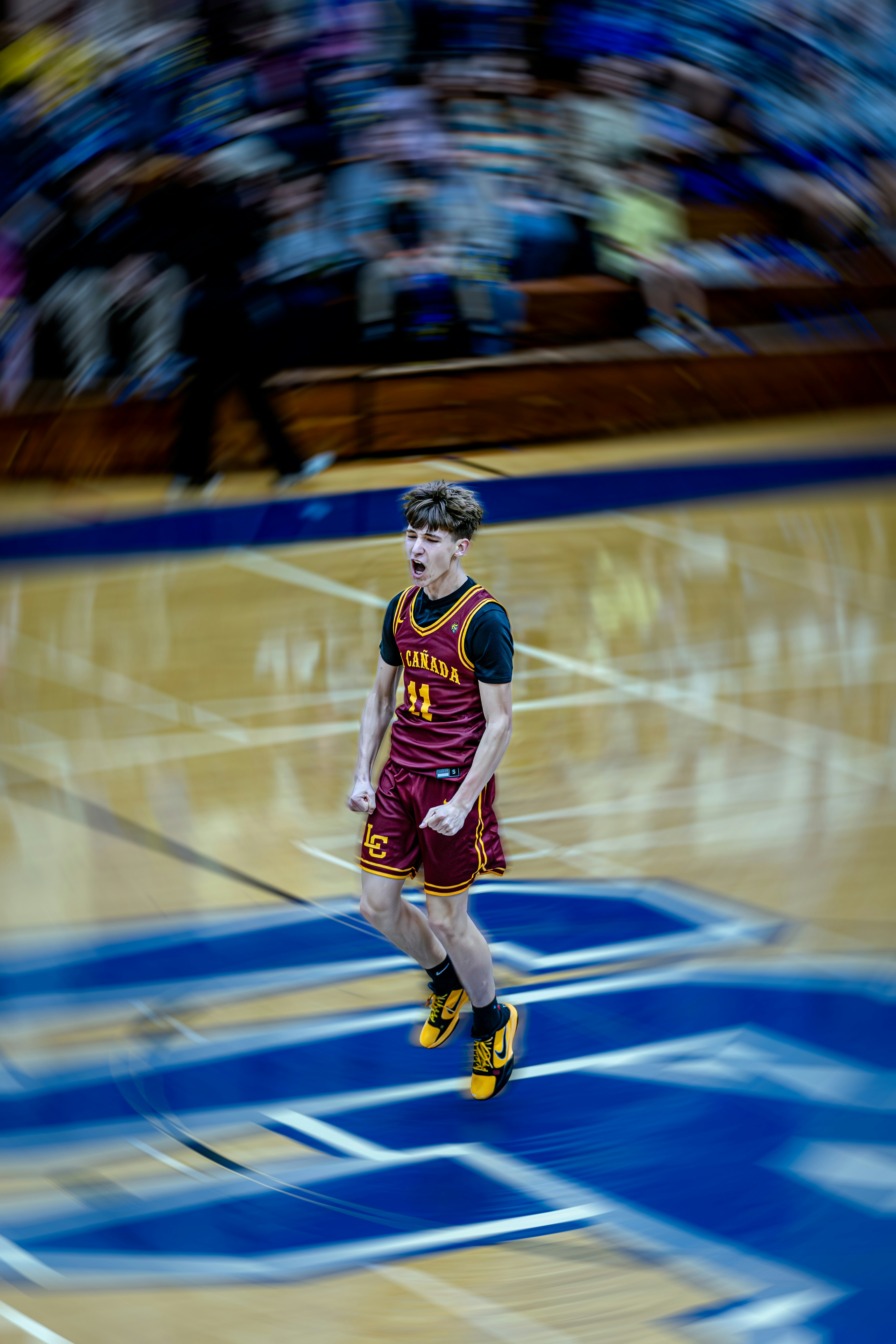 Young basketball player celebrating on court
