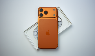 Orange smartphone with apple logo and camera lenses.