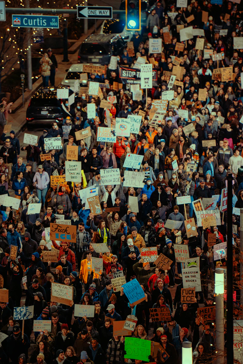 Crowd holding signs