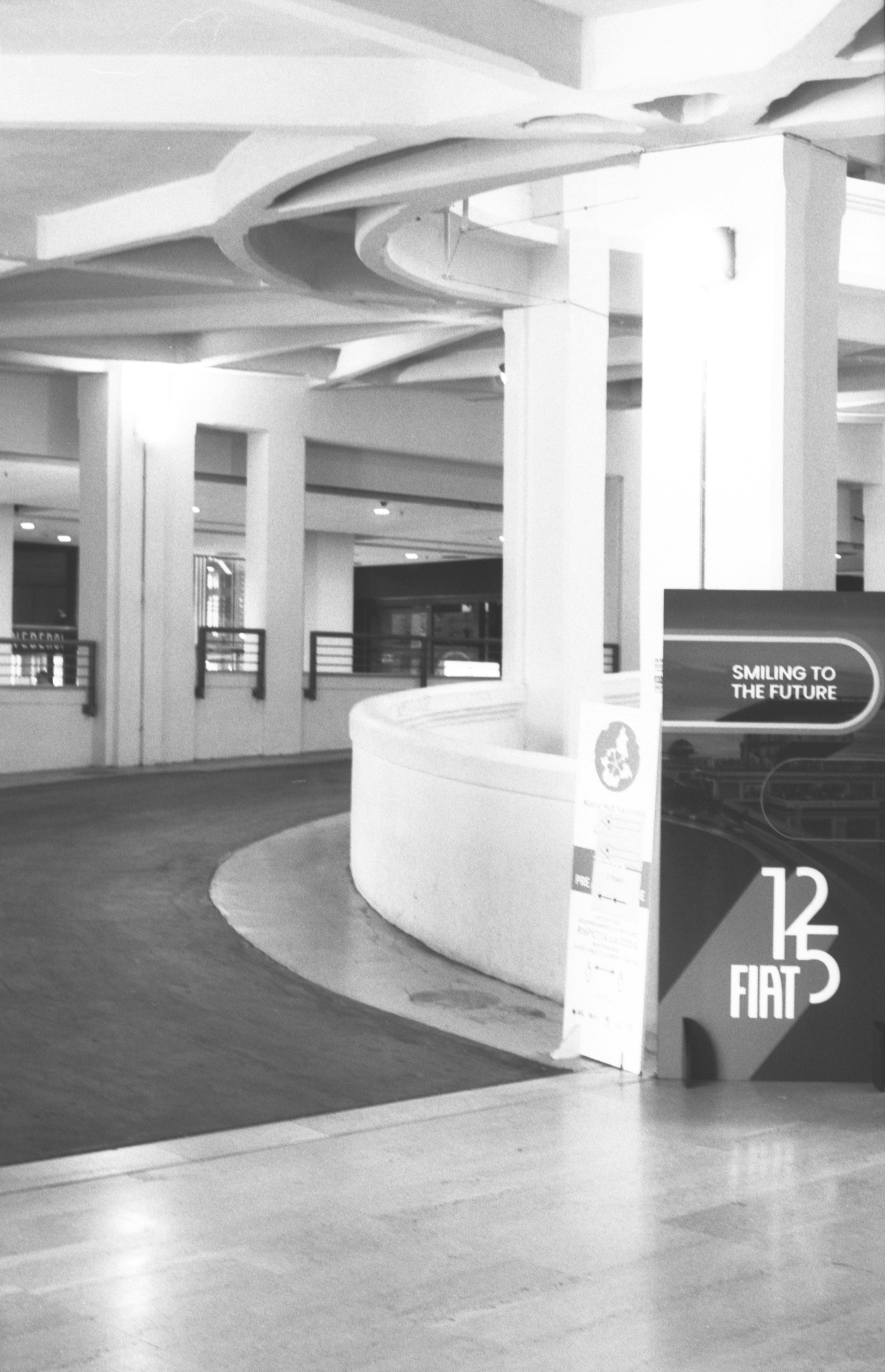 Modern interior with curved walls and pillars