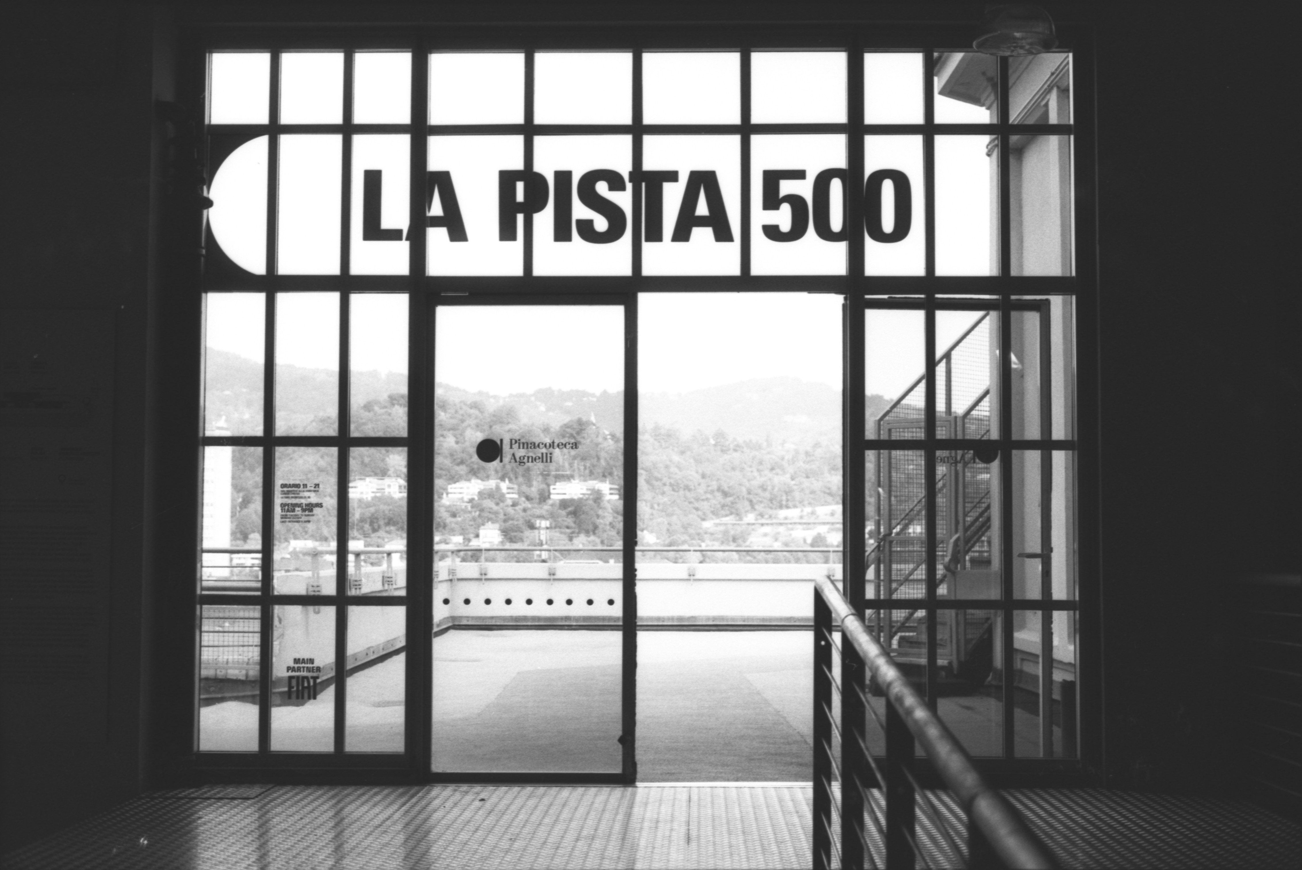 Entrance with "la pista 500" sign and view outside