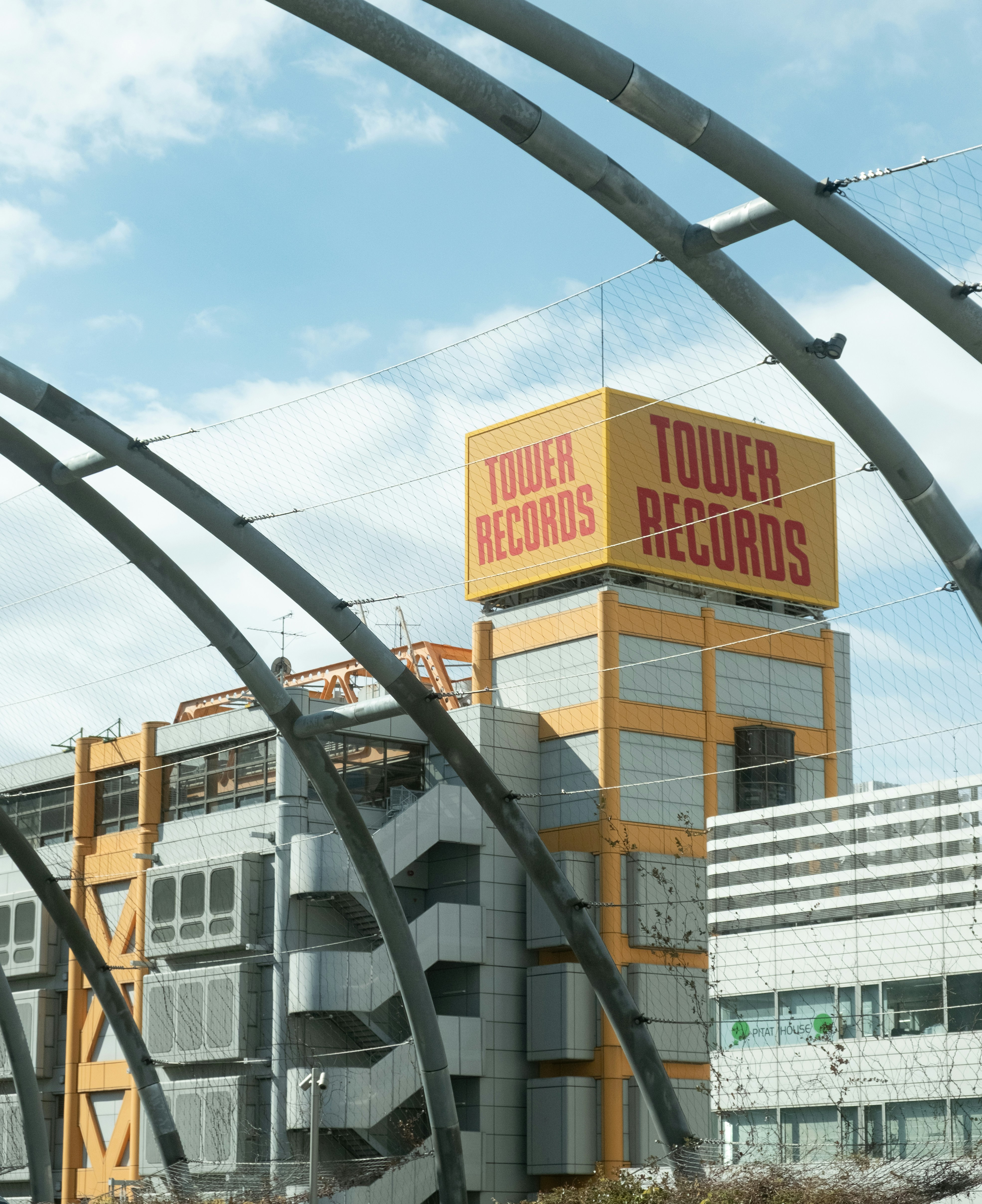 Tower records building with distinctive signage.