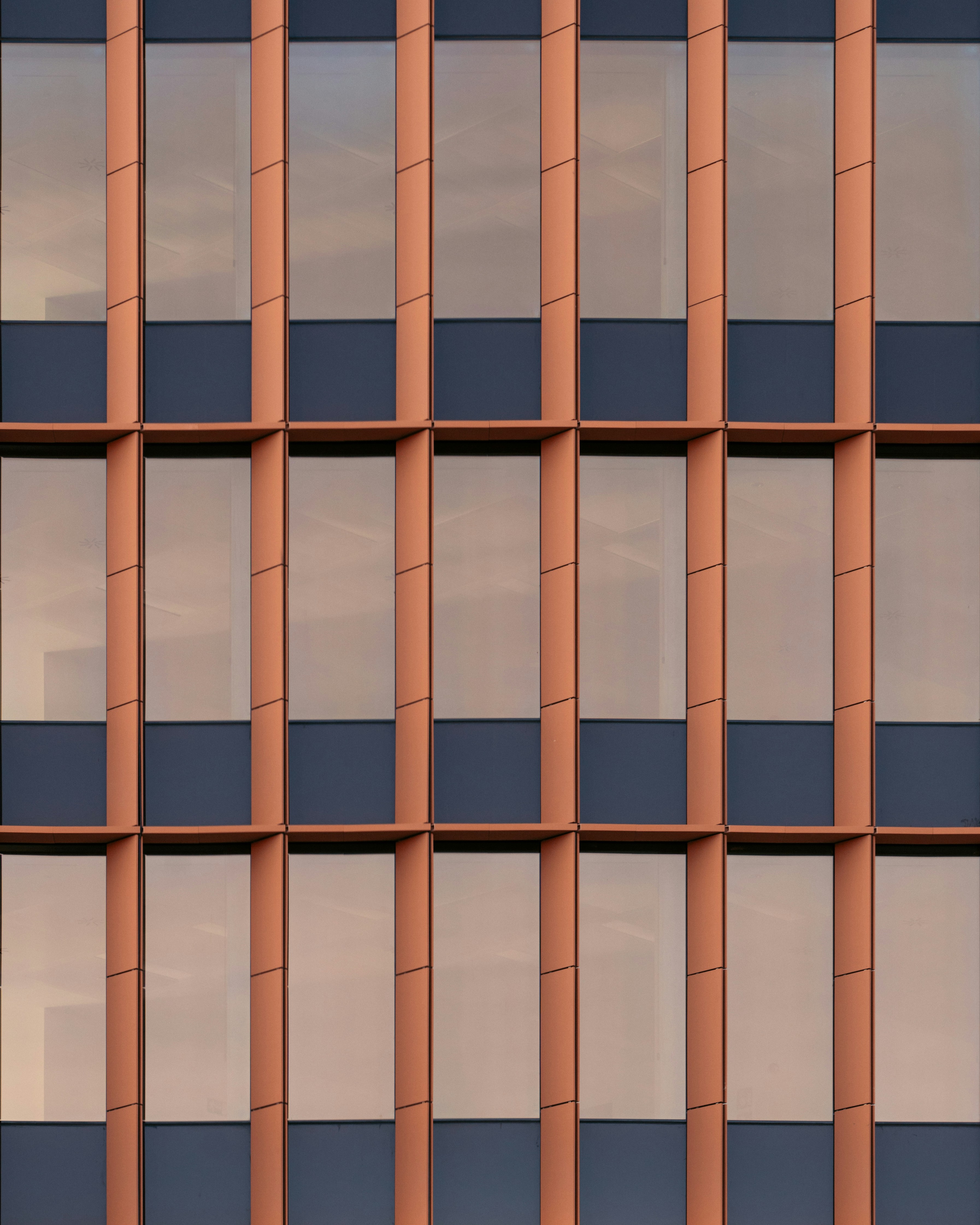 Modern building facade with repeating window pattern
