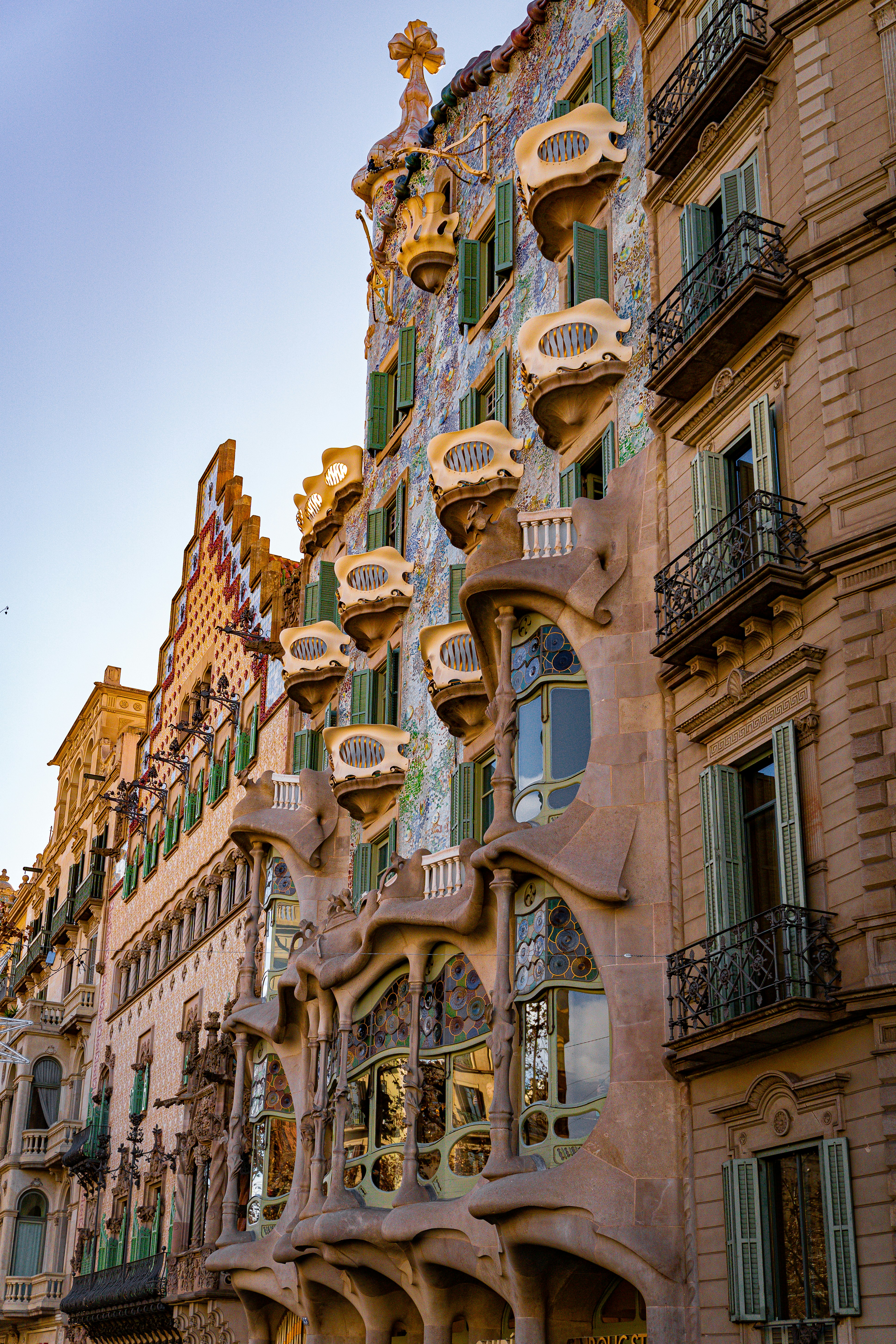 Ornate building with unique wavy facade and balconies