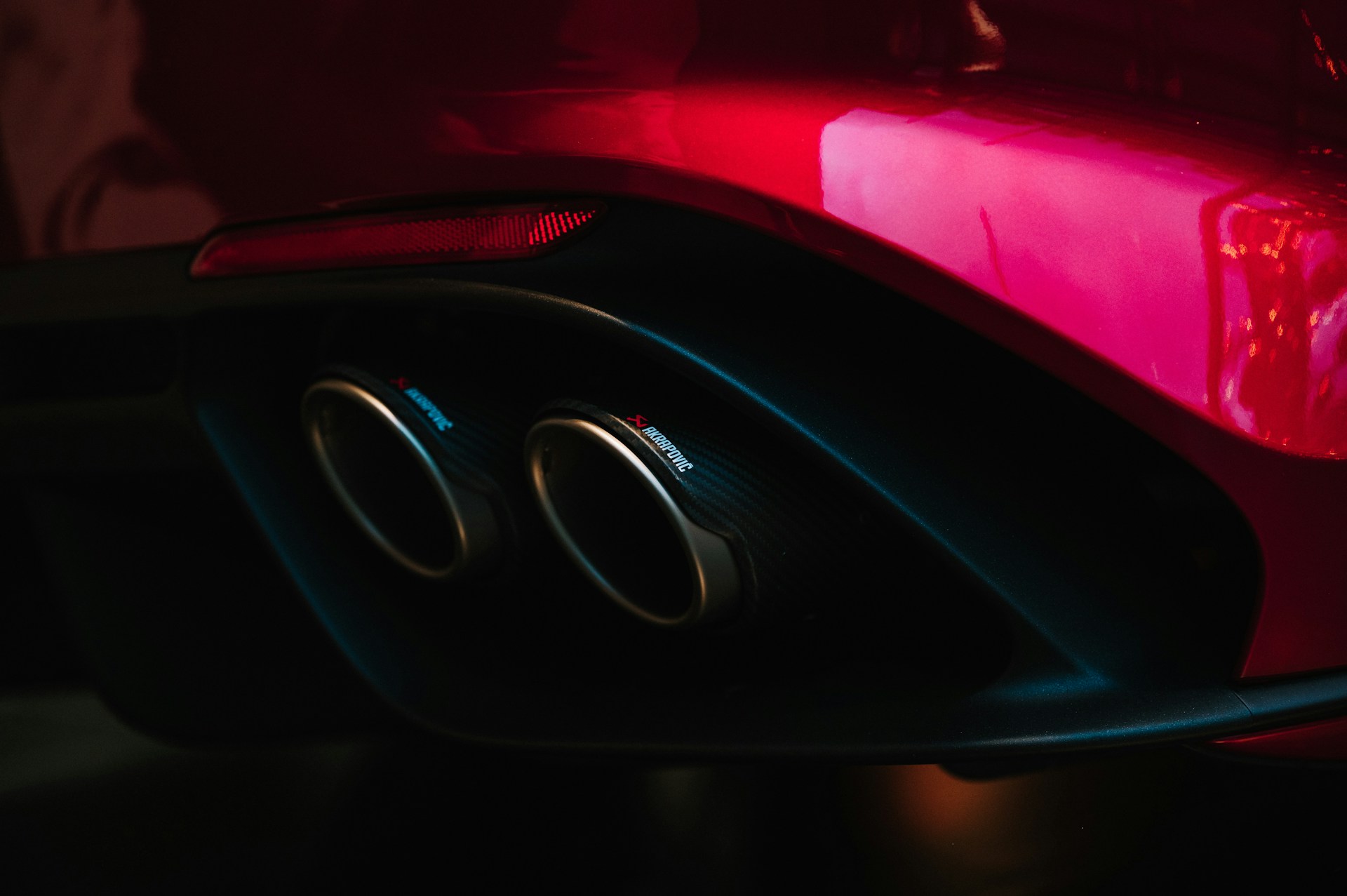Close-up of a car's dual exhaust pipes