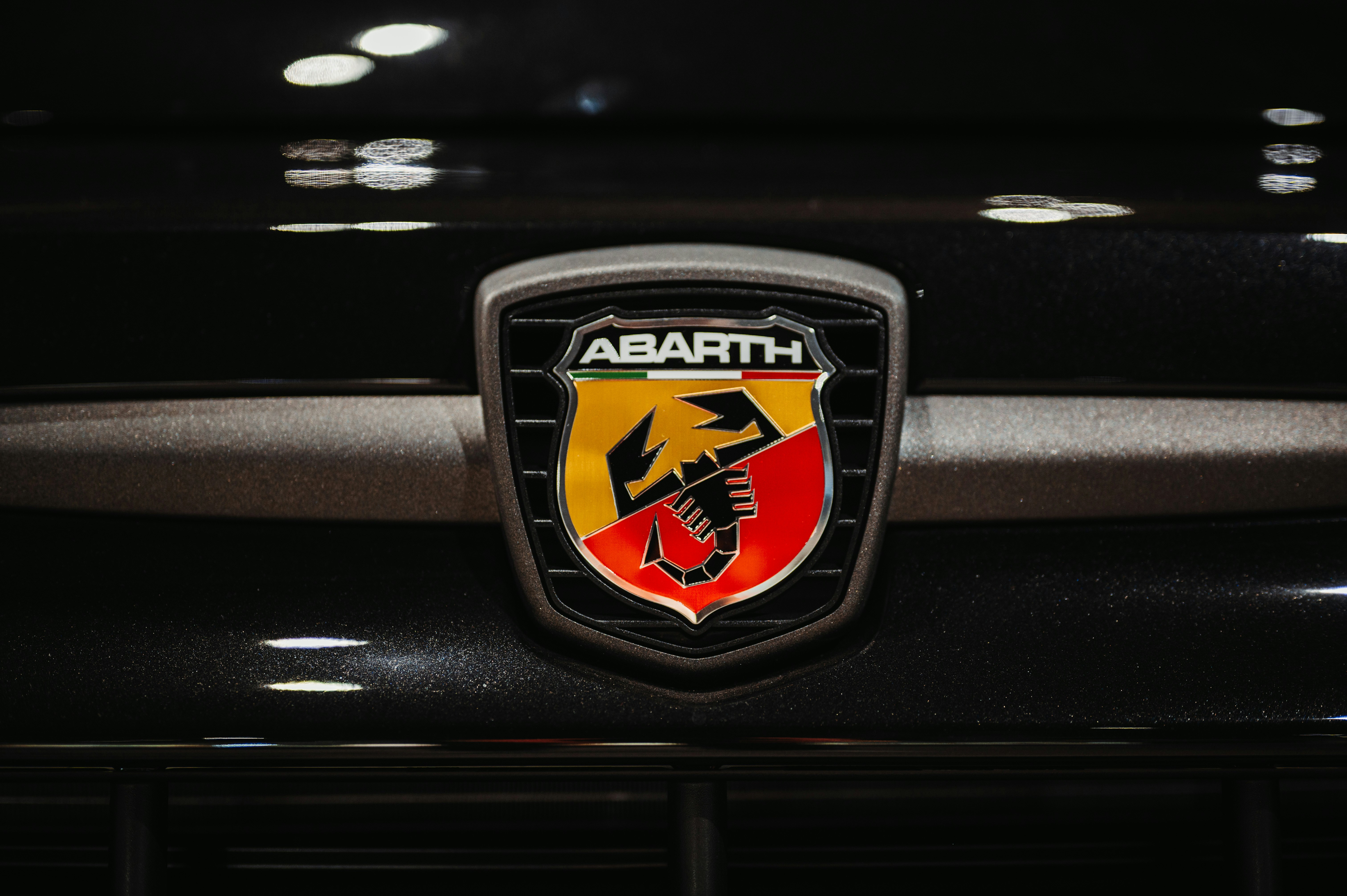 Abarth logo on a black car grille