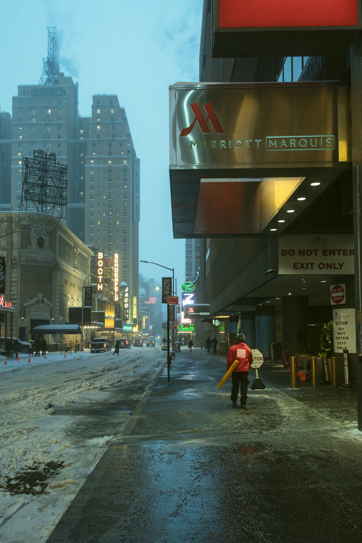 The New York Marriott Marquis entrance in Times Square on a snowy evening — every qualifying Marriott Bonvoy stay this fall earns bonus points