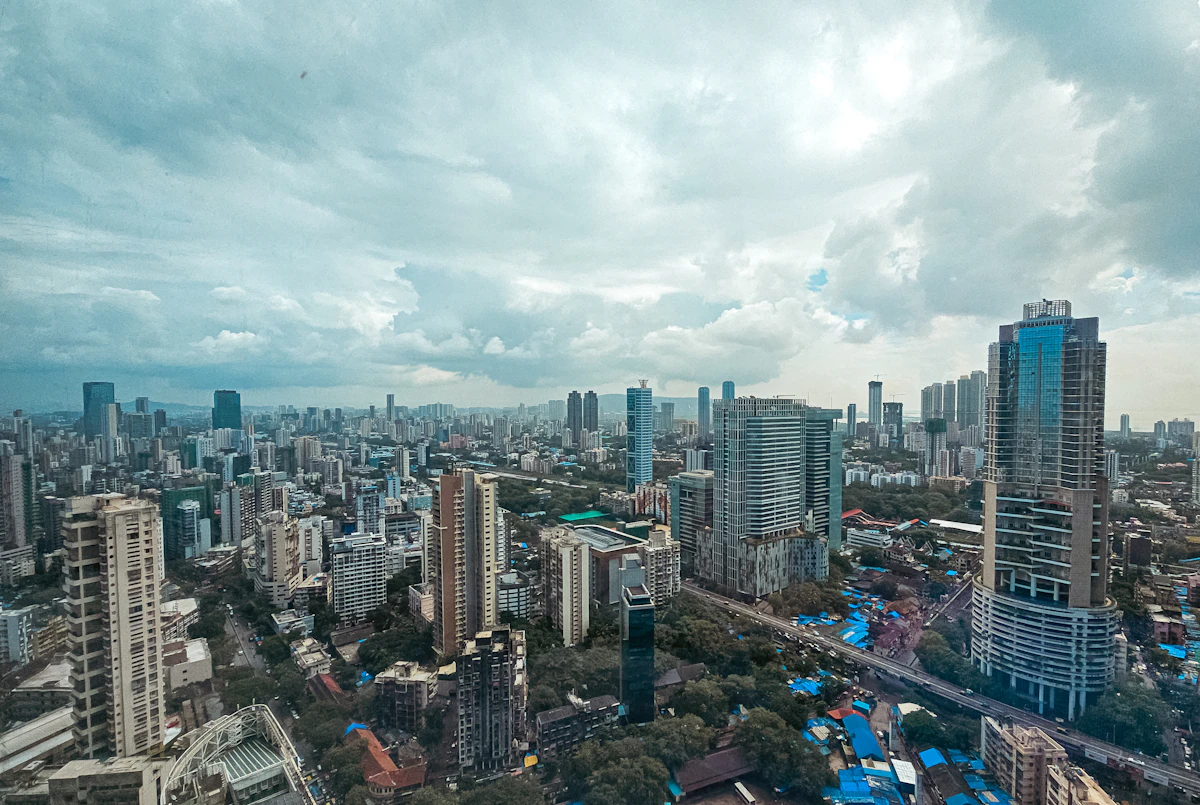 The Mumbai skyline under monsoon clouds