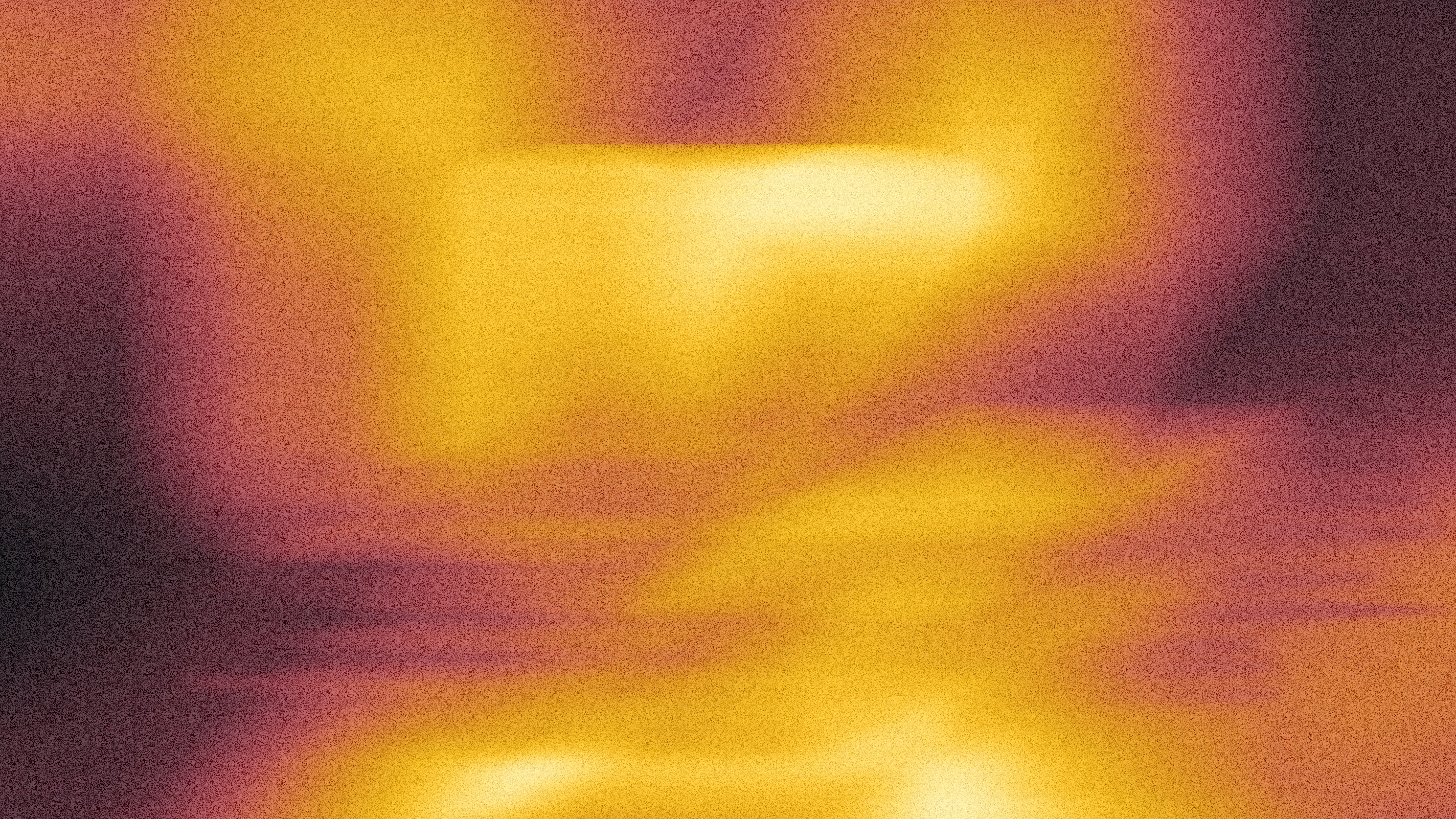 Abstract warm orange and purple blurred shapes