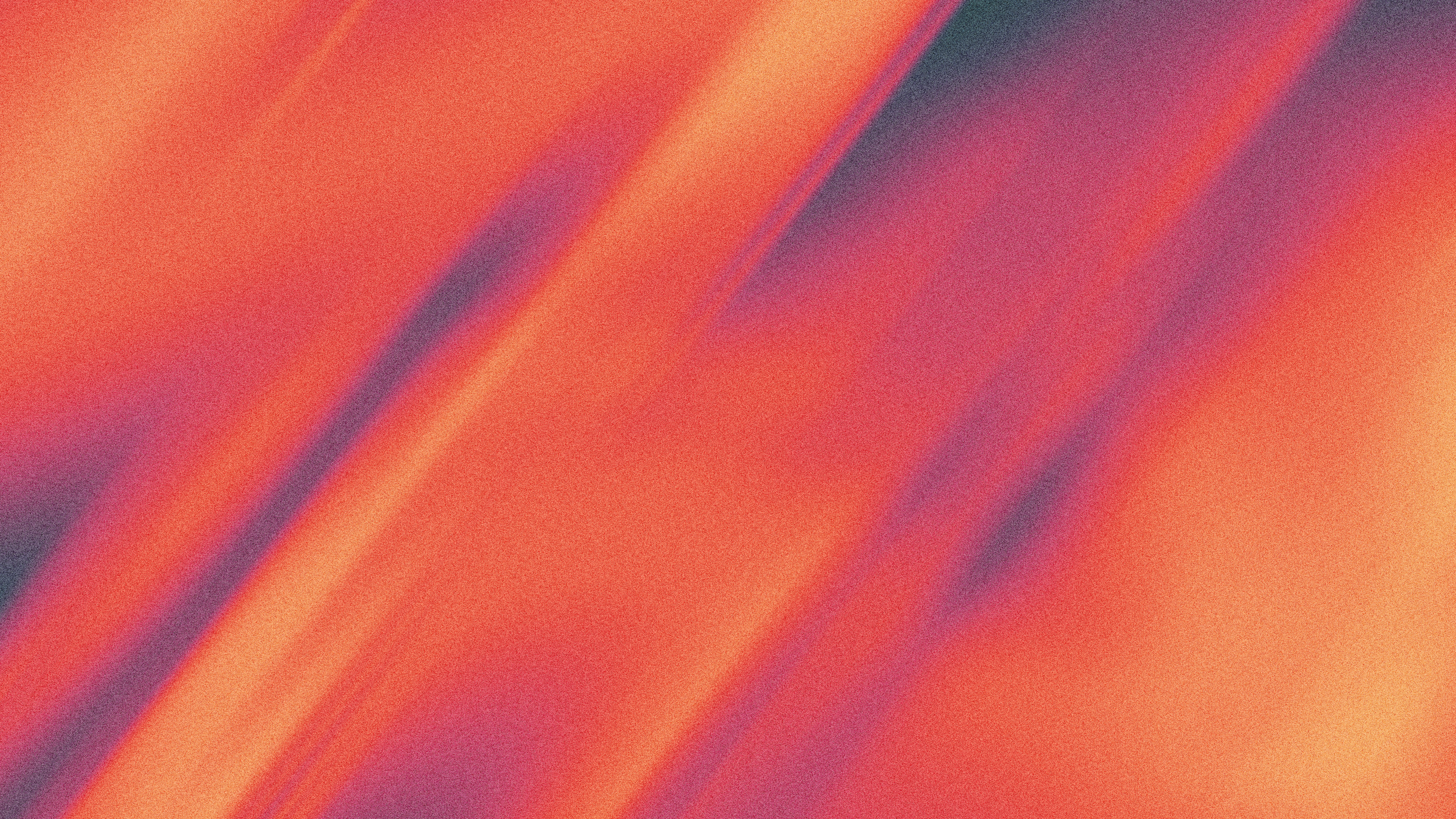 Abstract streaks of orange and purple light