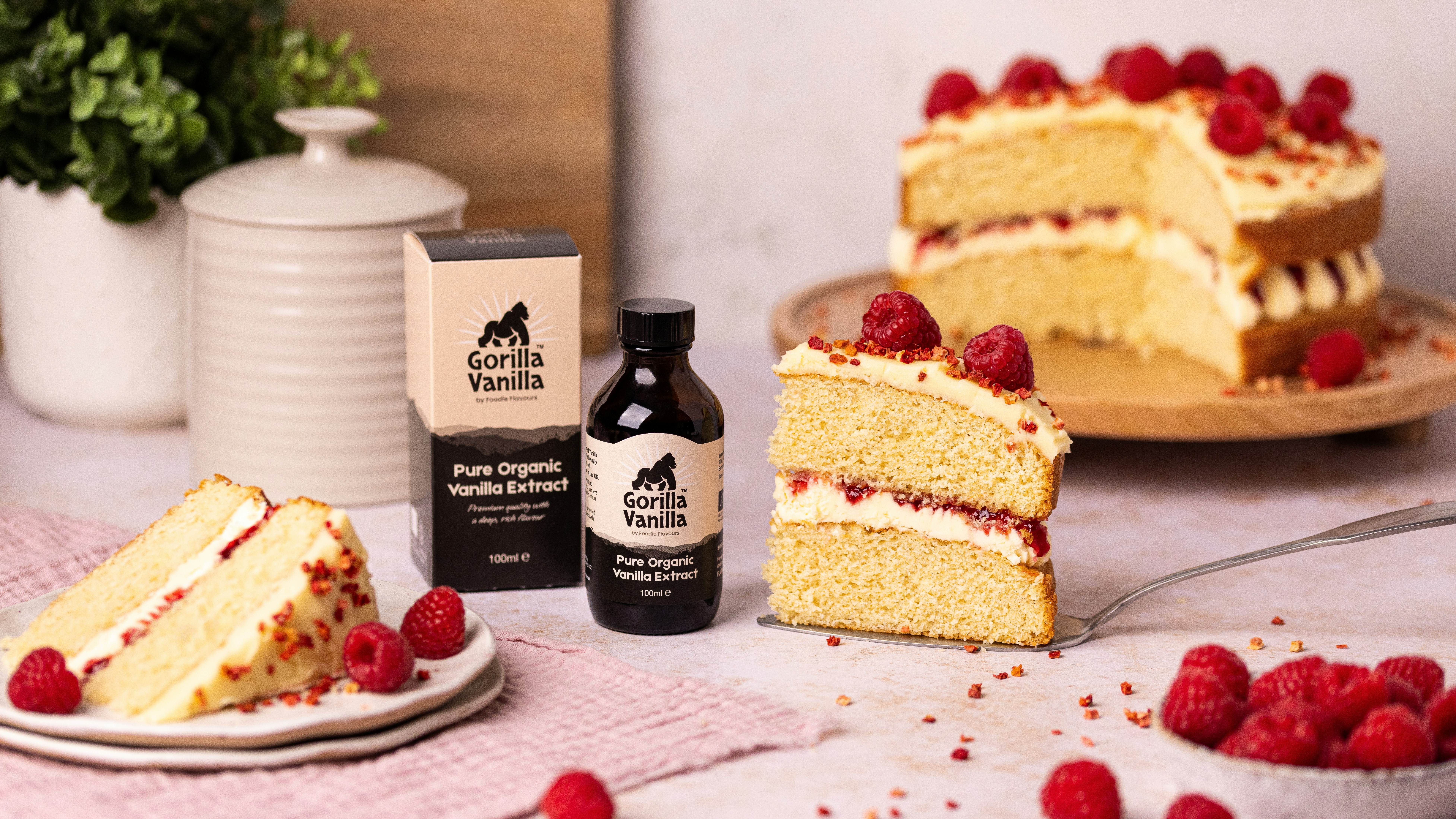 Vanilla cake with raspberry filling and fresh berries