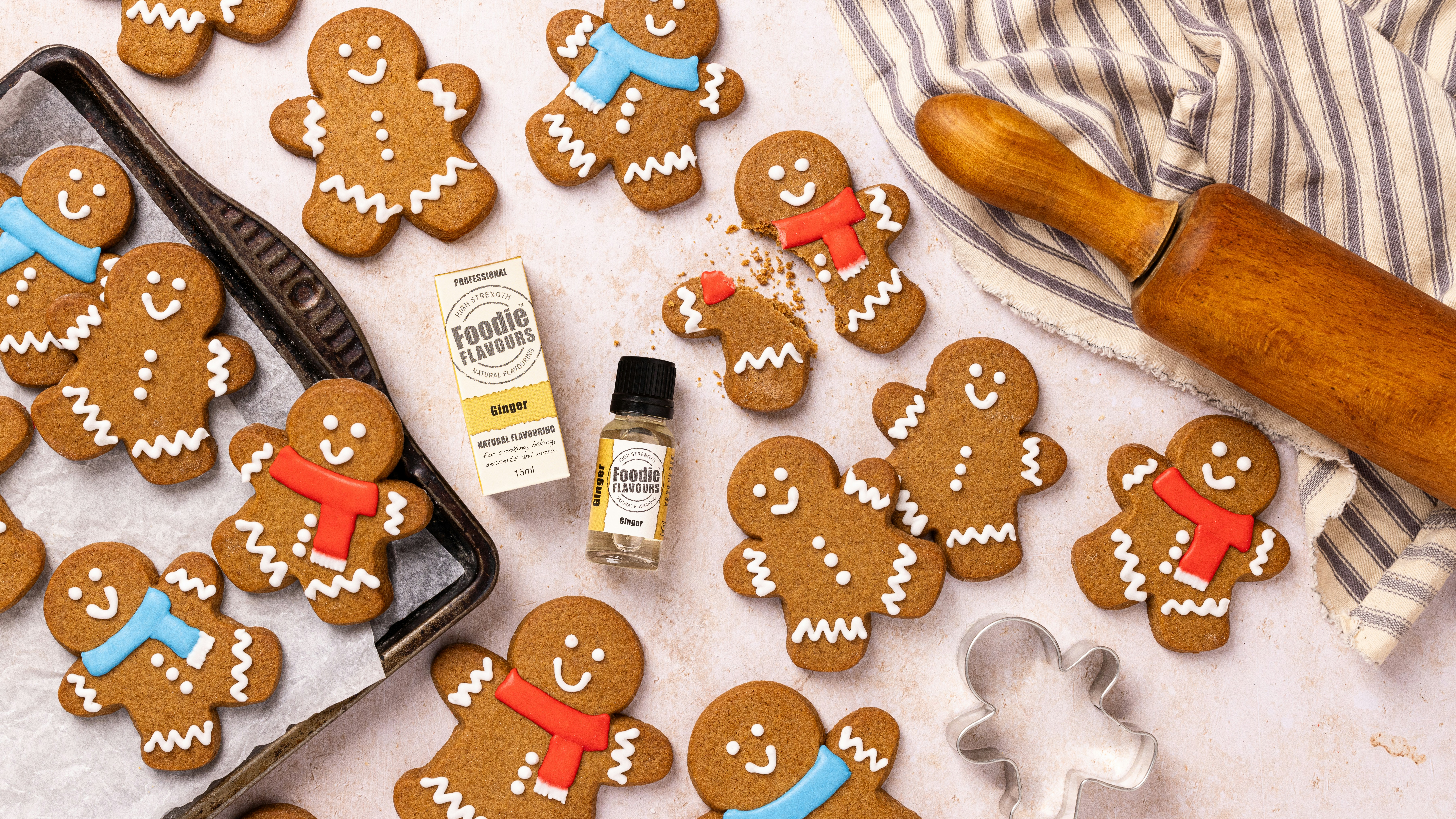 Gingerbread cookies decorated with icing and scarves.
