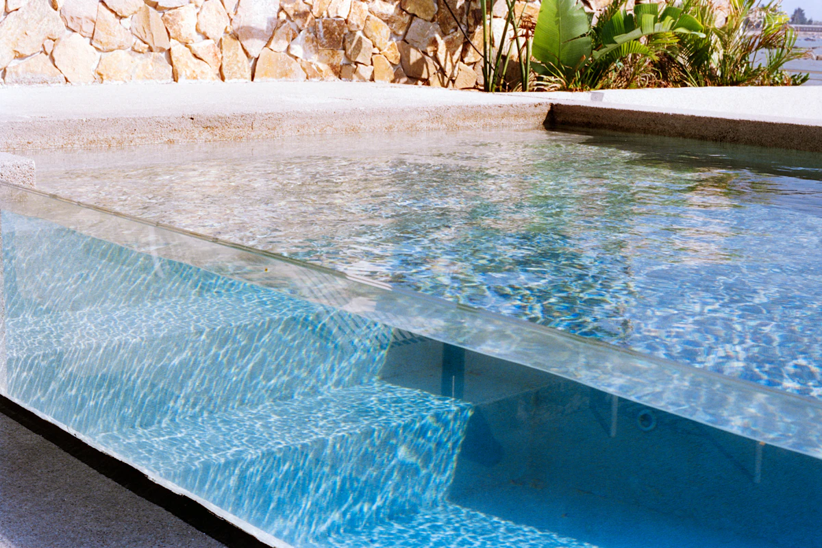 crystal clear blue water in modern swimming pool