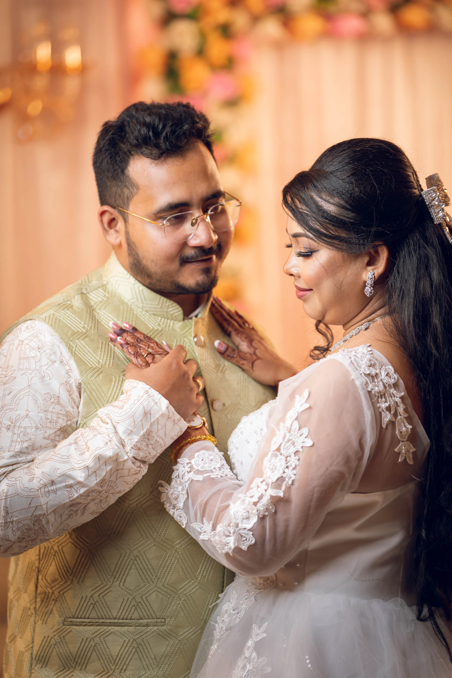 Indian bride and groom sharing a warm emotional moment during their wedding