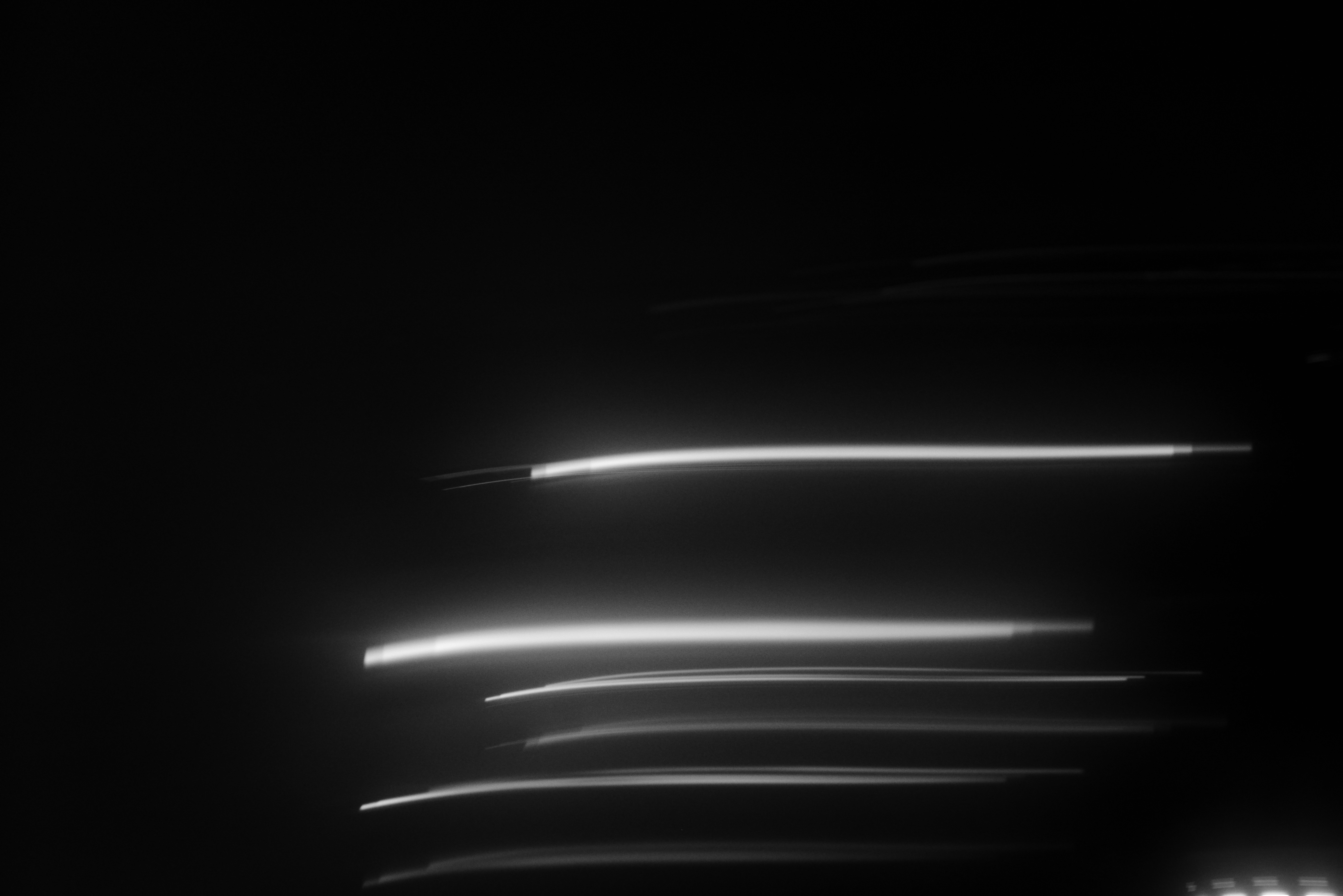 Abstract light streaks on a dark background
