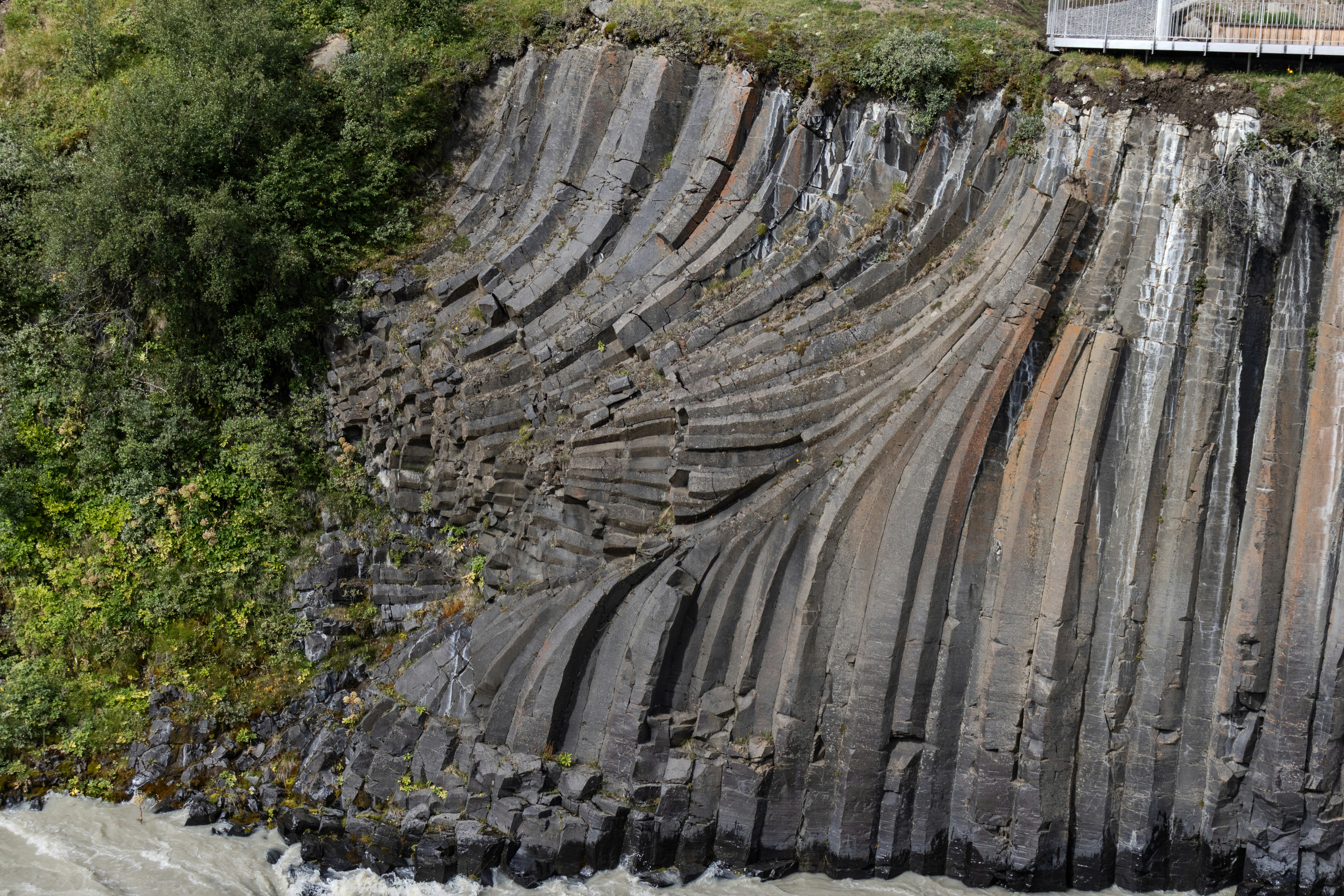 Basalt columns form a natural cliff face
