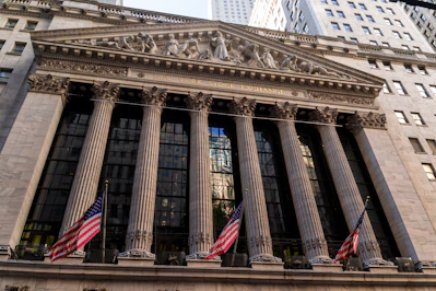 New york stock exchange building with american flags