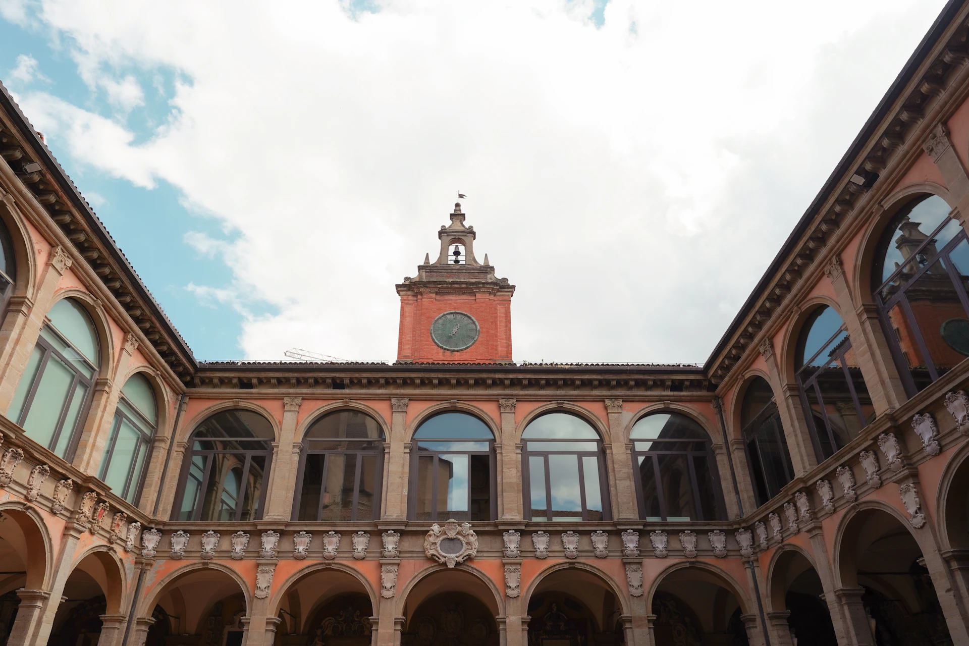 Courtyard of a historic building with arched windows