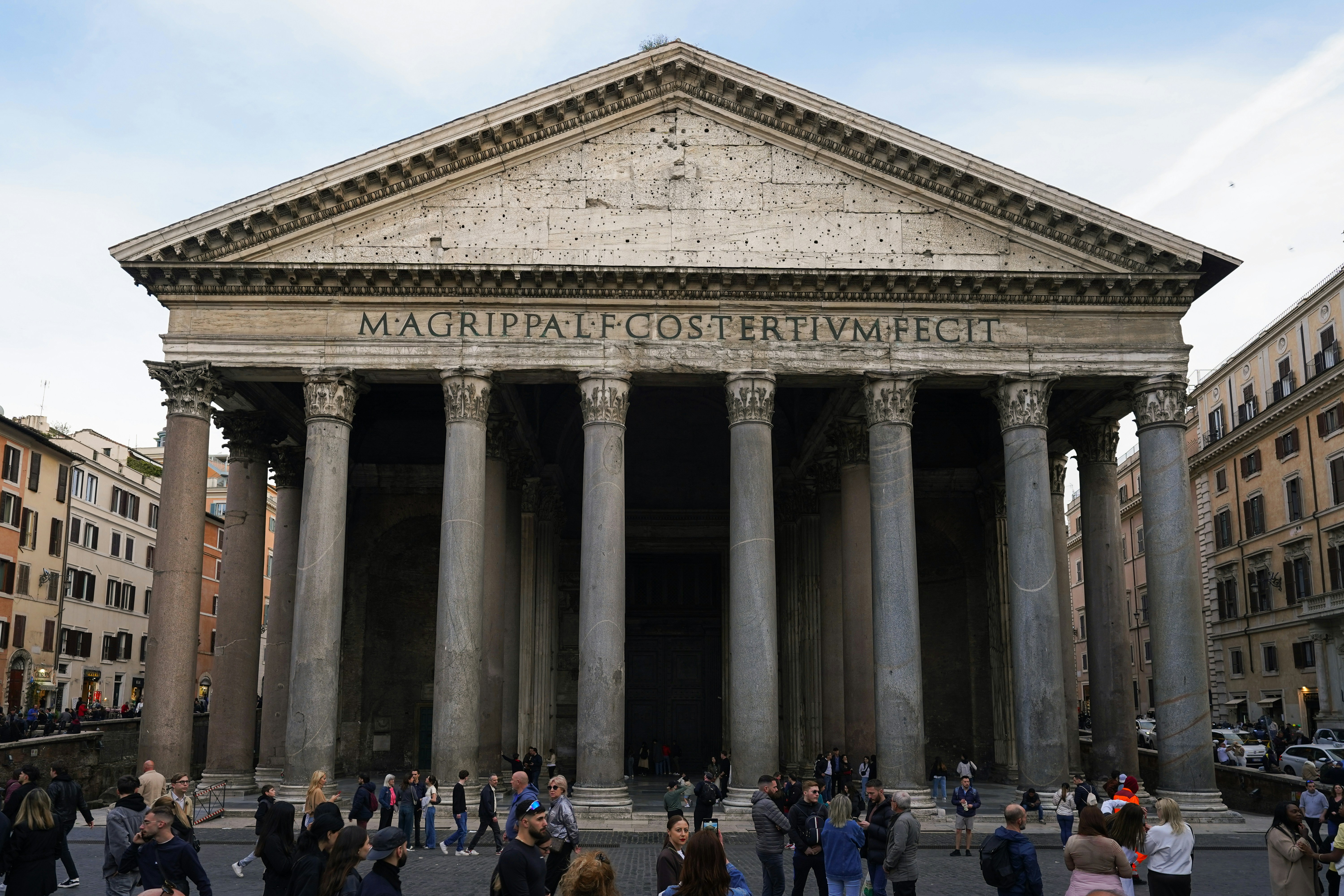 The pantheon in rome with people outside