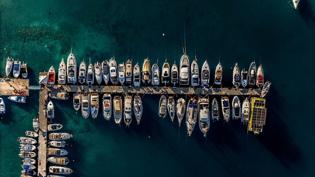 Aerial view of motor yachts berthed in a marina