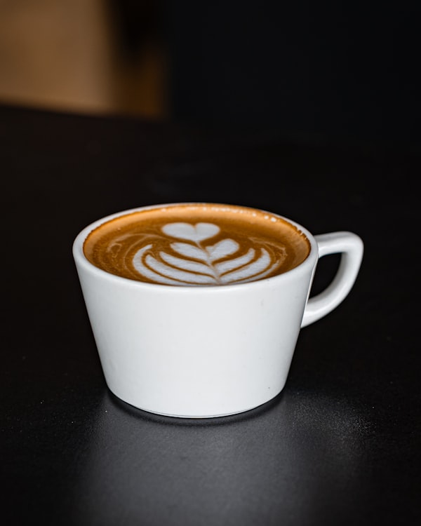 Filiżanka kawy z latte art