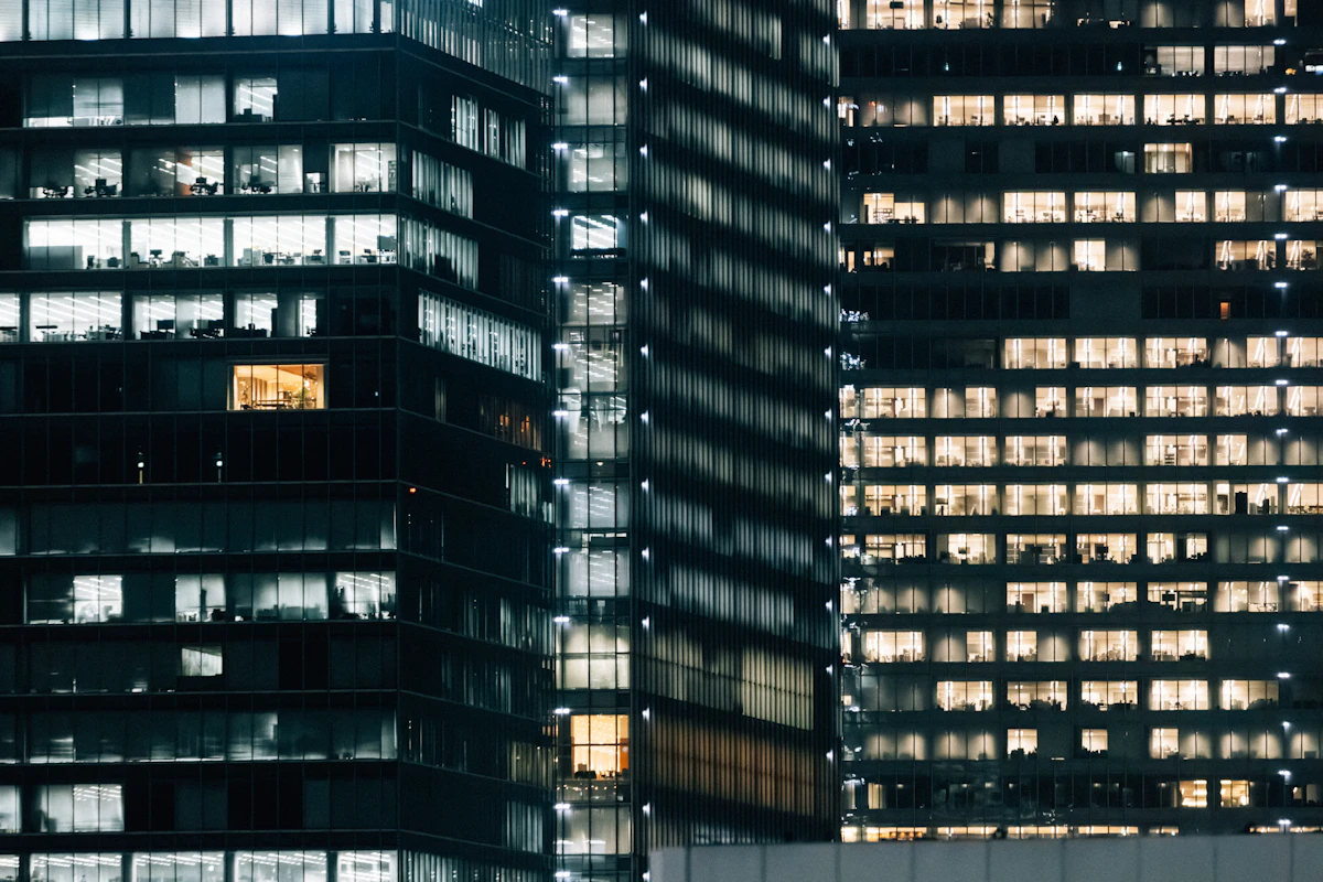 Commercial office buildings lit up at night