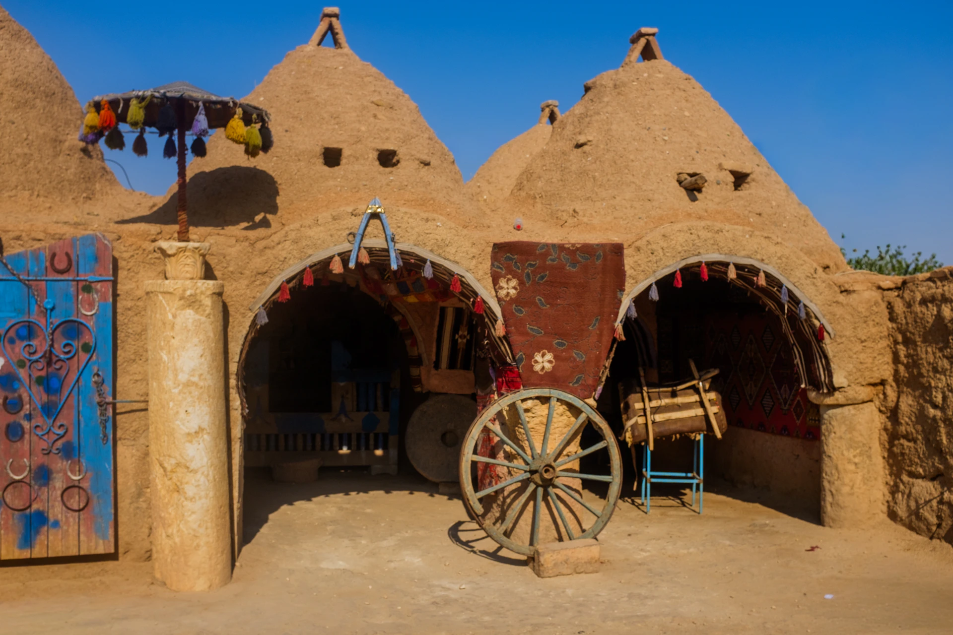 Traditional mud-brick beehive homes with arched entrances