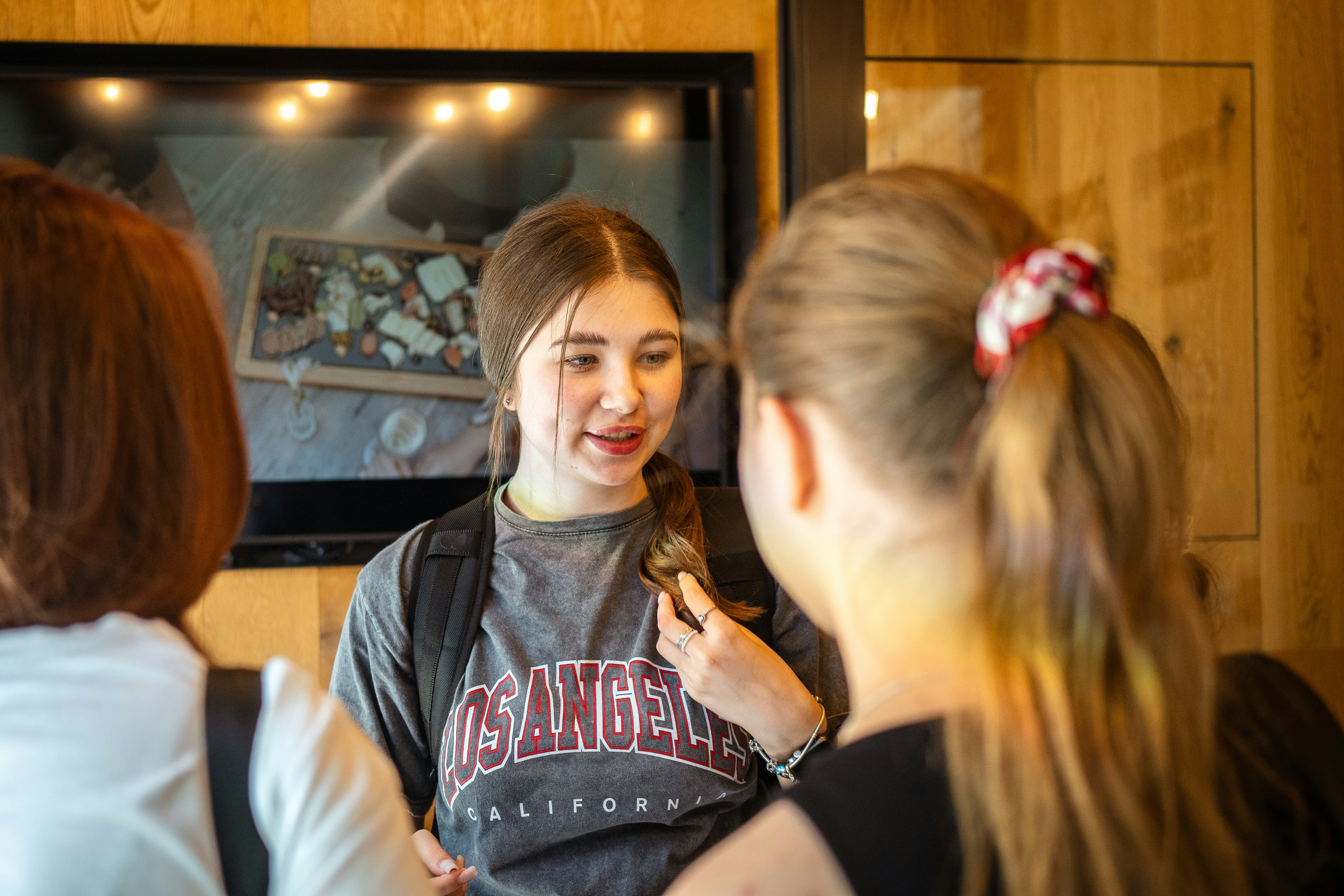 Young women talking in a casual setting