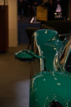 Close-up of a shiny green car