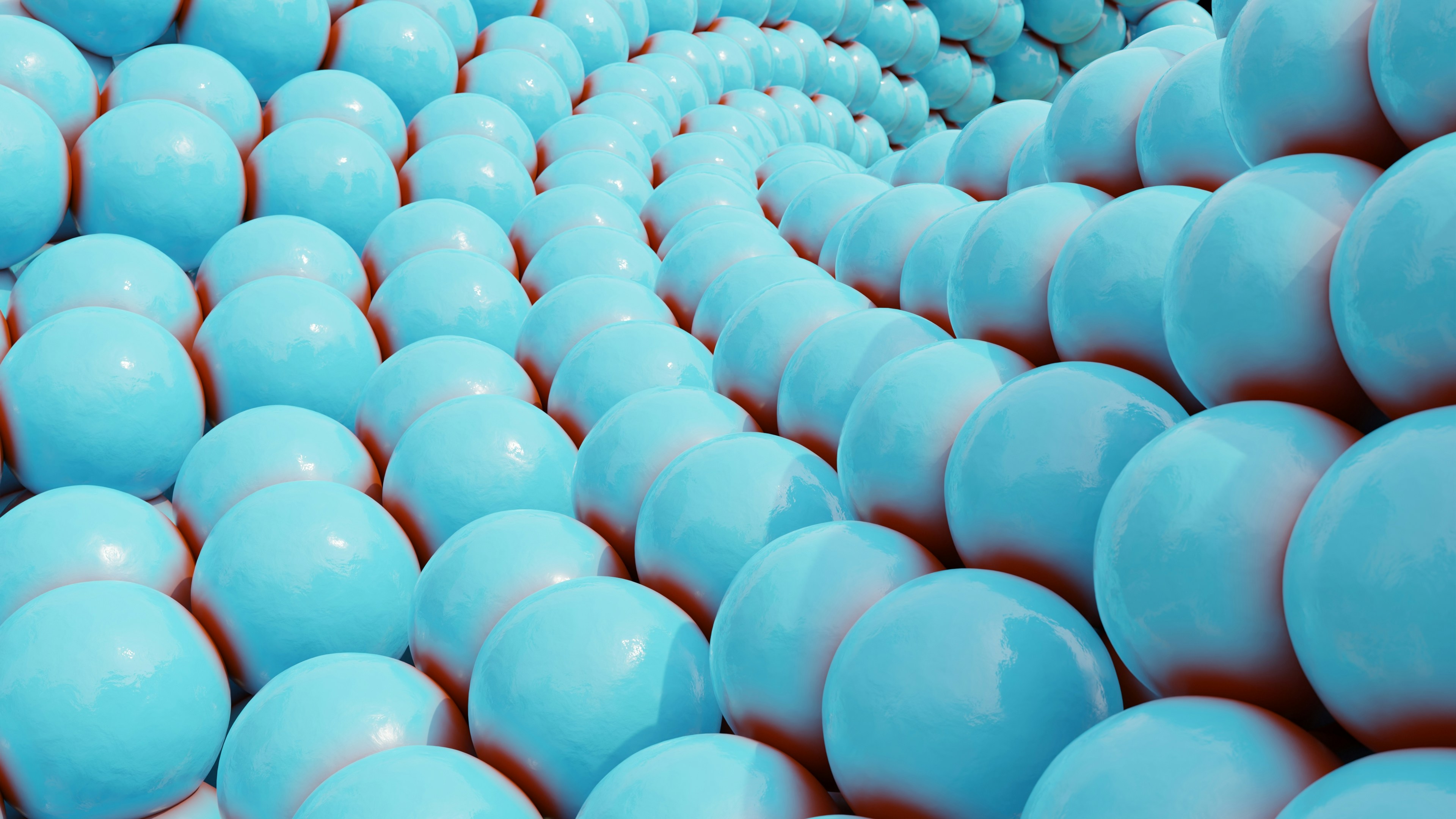 淡い青色の球体が並ぶ螺旋状のパターンを形成しています。