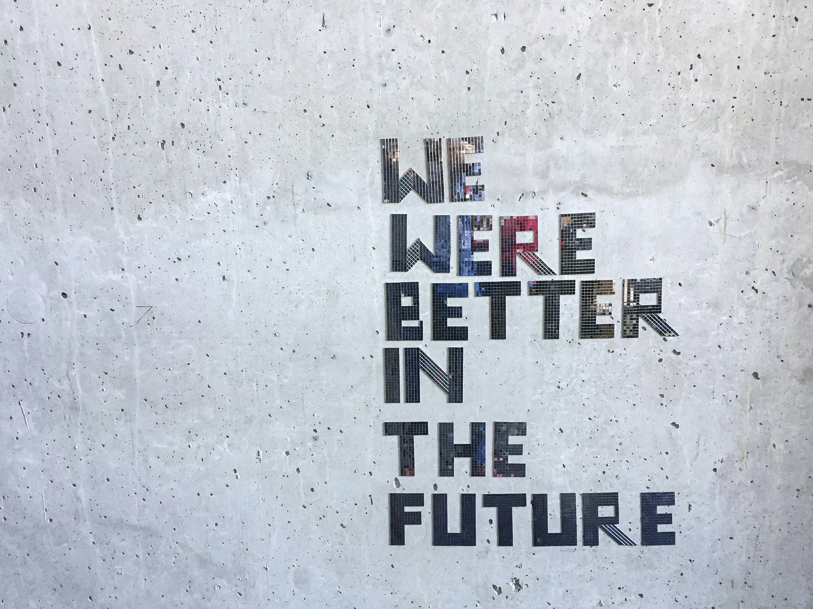 We were better in the future text on wall