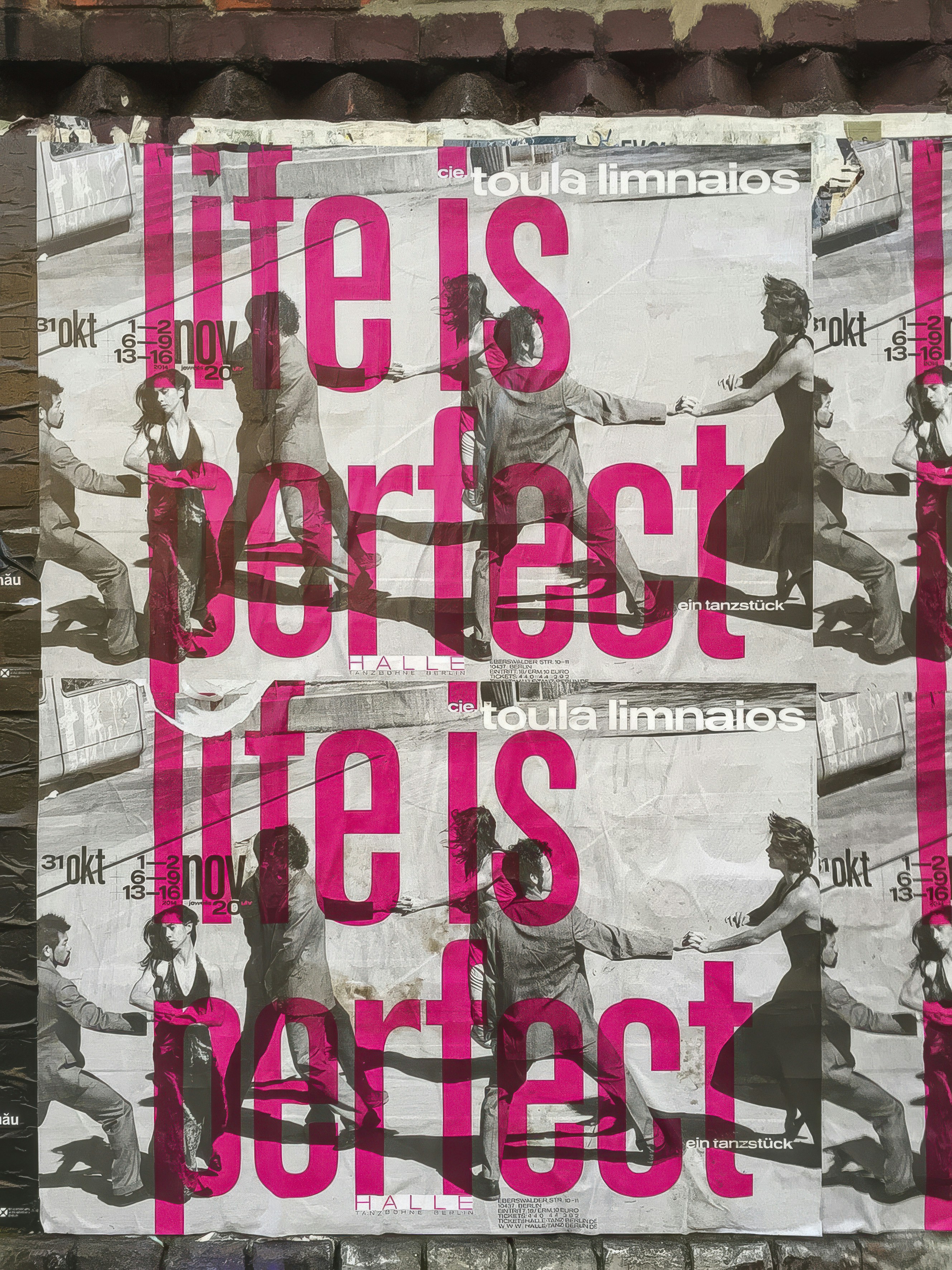 Poster with "life is perfect" text and dancing figures.