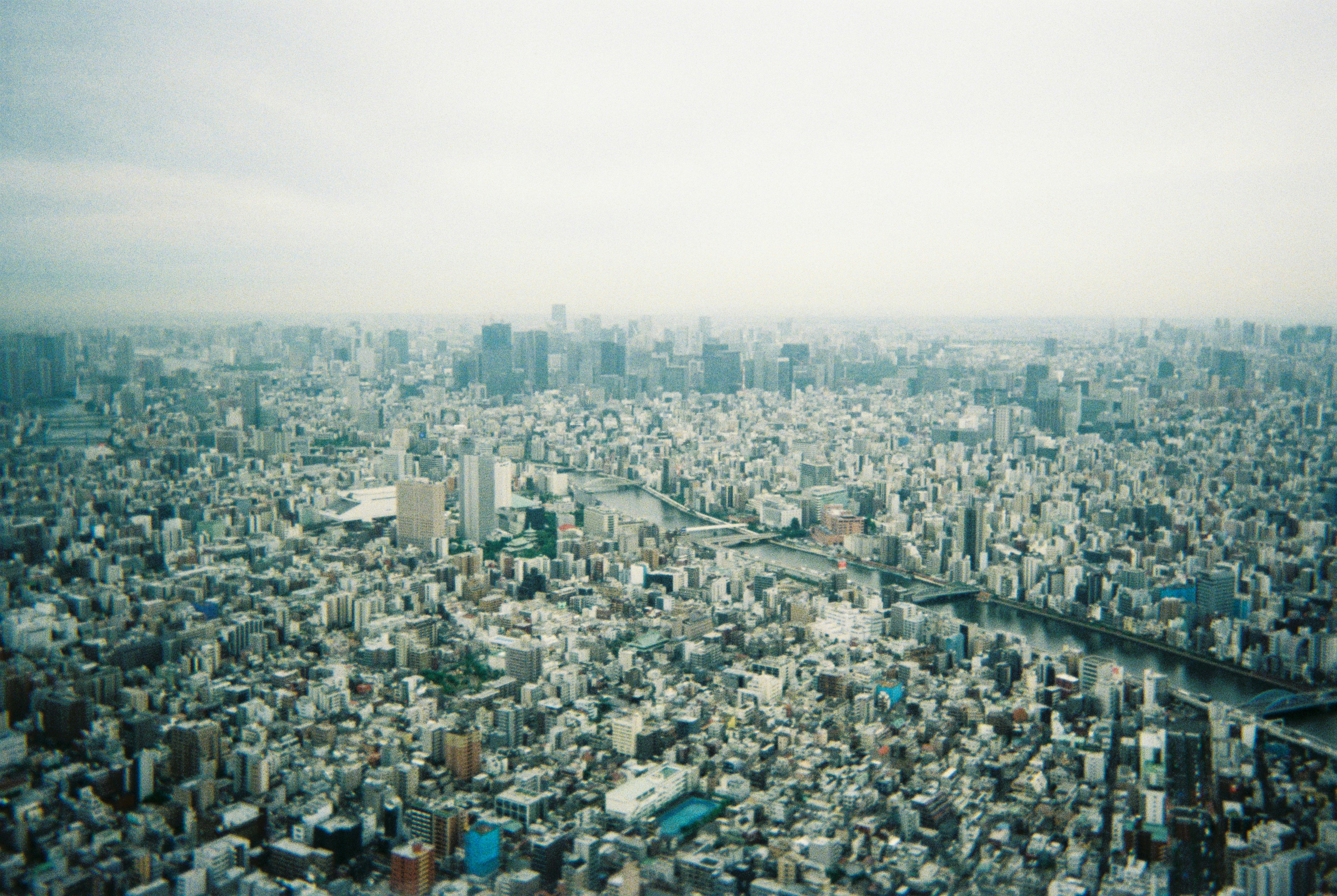 Vast cityscape with countless buildings under an overcast sky