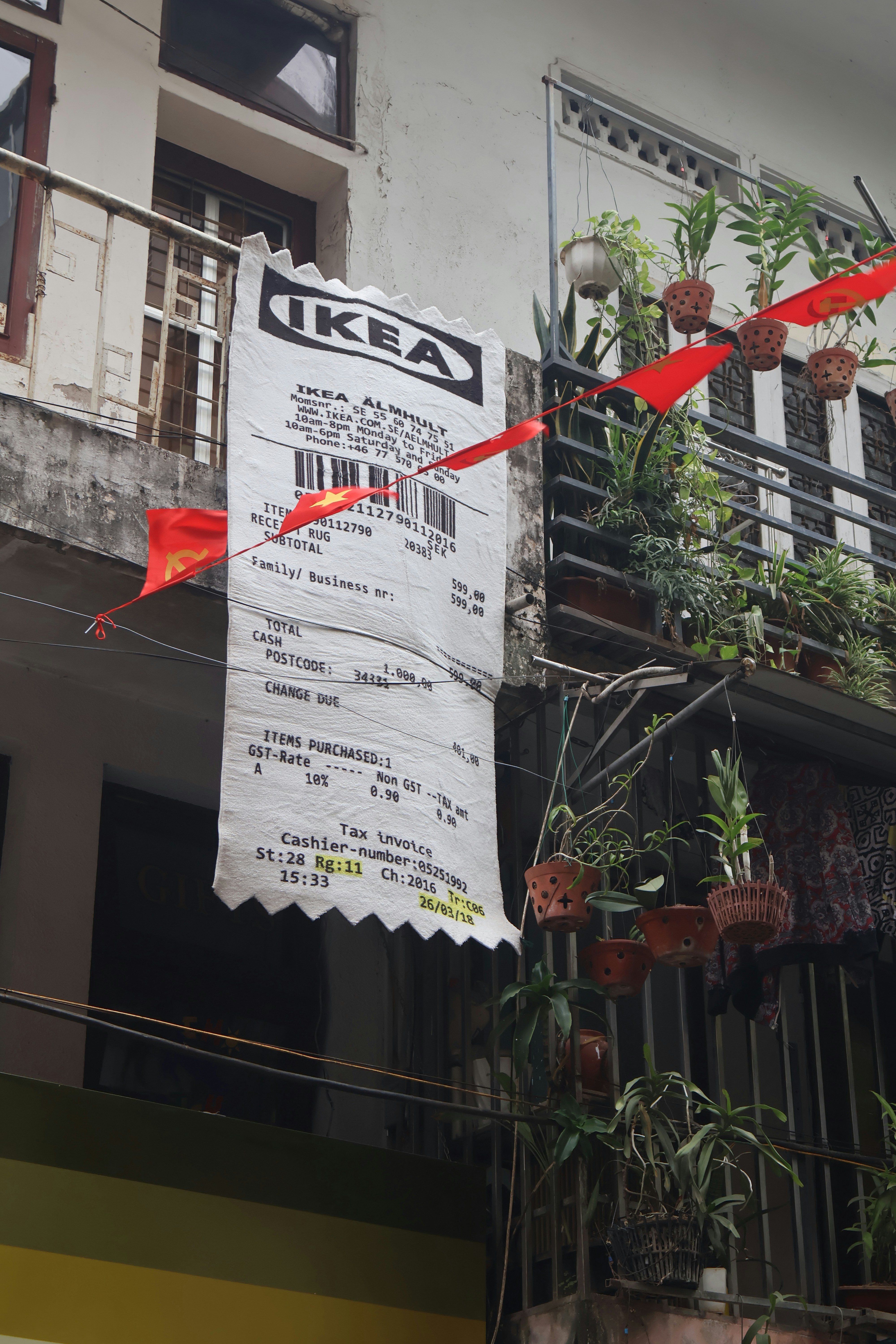 Ikea receipt hanging outside a building