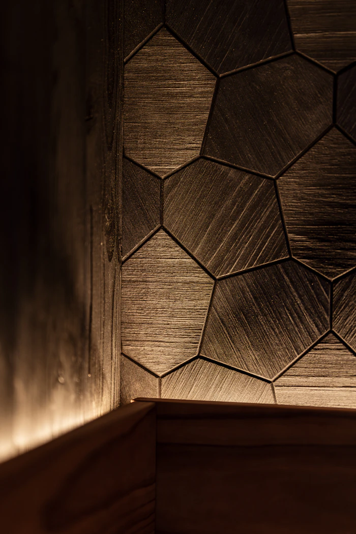 Wood slat accent wall with soft lighting