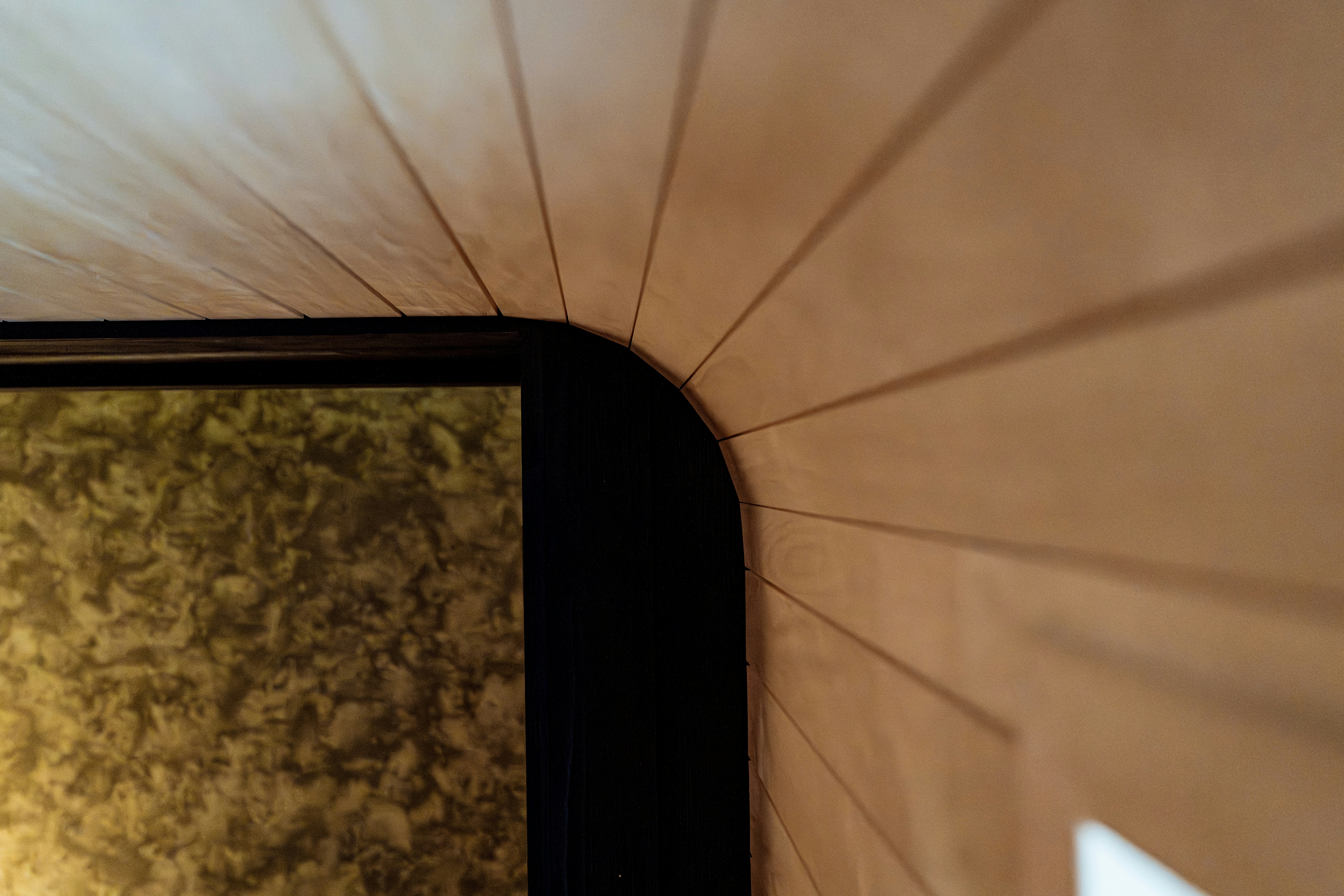 Close-up of a wooden wall with a black frame