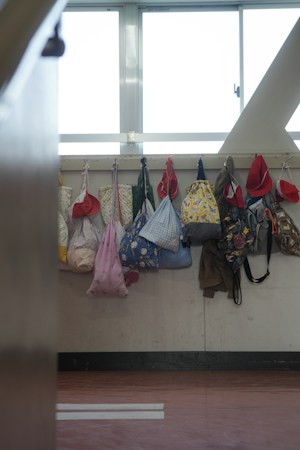 Backpacks and hats hanging on school hooks, a reminder of the 10,400 students who left Clark County classrooms this year