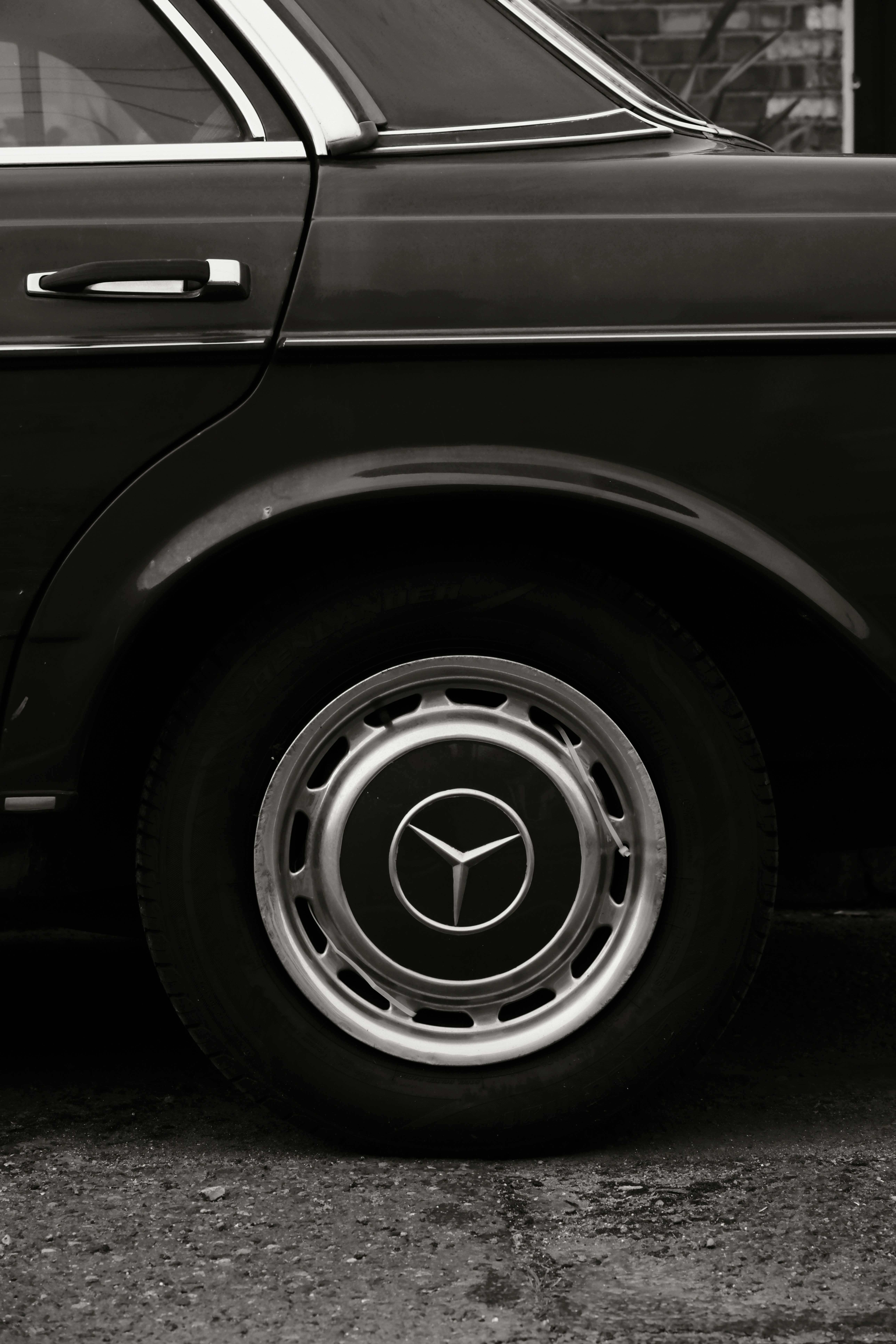 Close-up of a vintage mercedes-benz car wheel