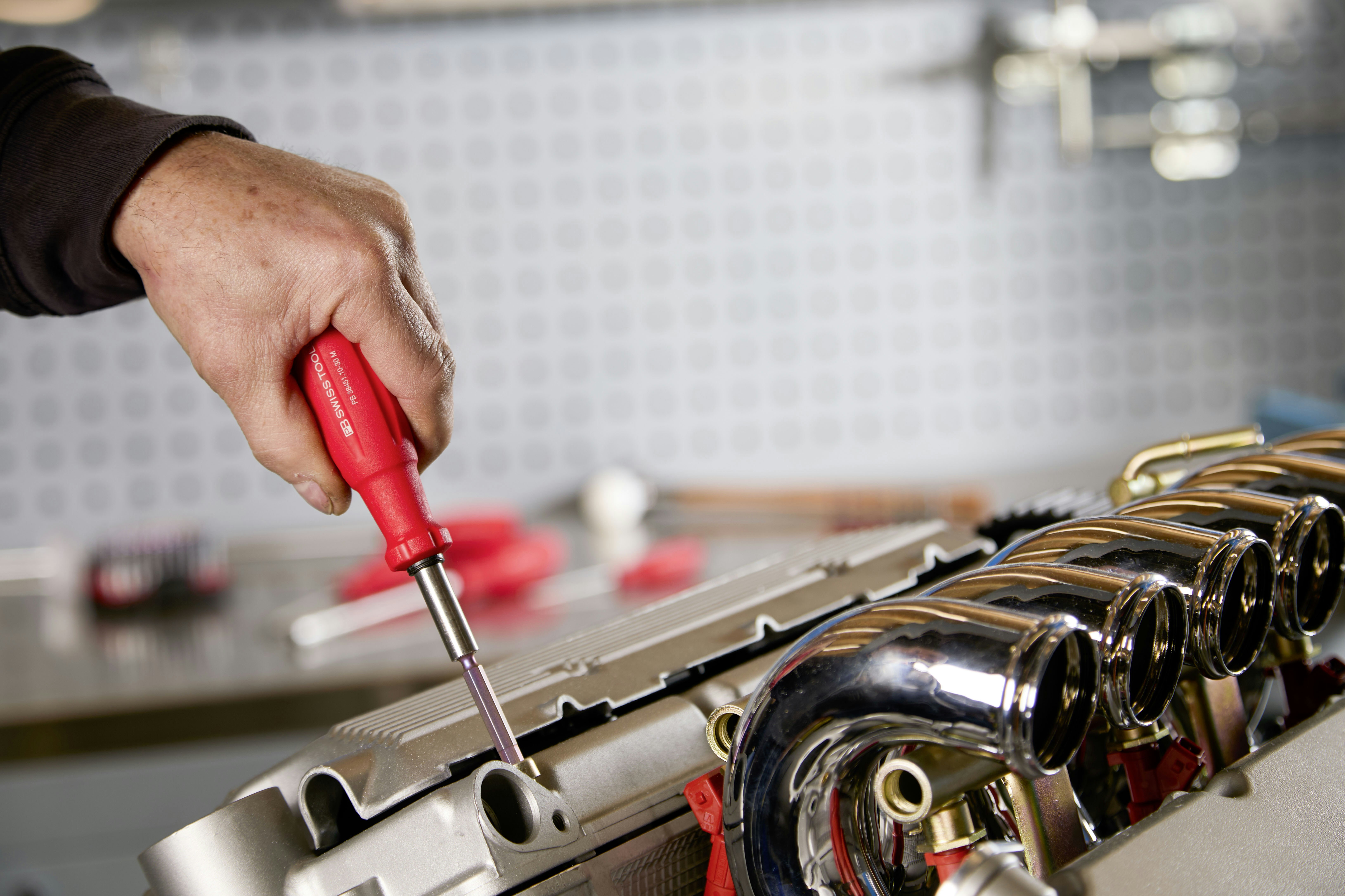 automotive component assembly - what is an example of contract manufacturing