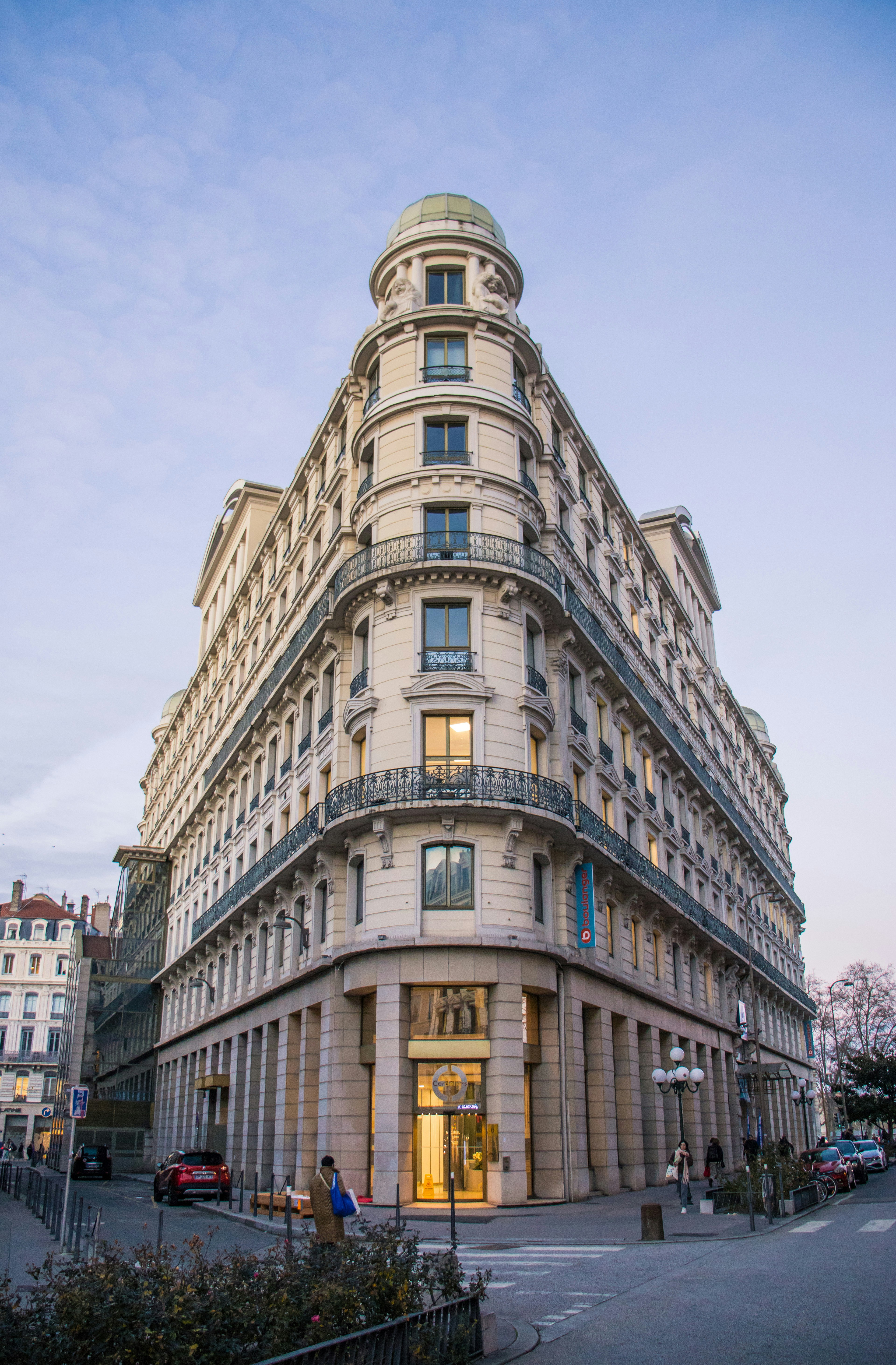 Ornate building with a domed turret at a street corner