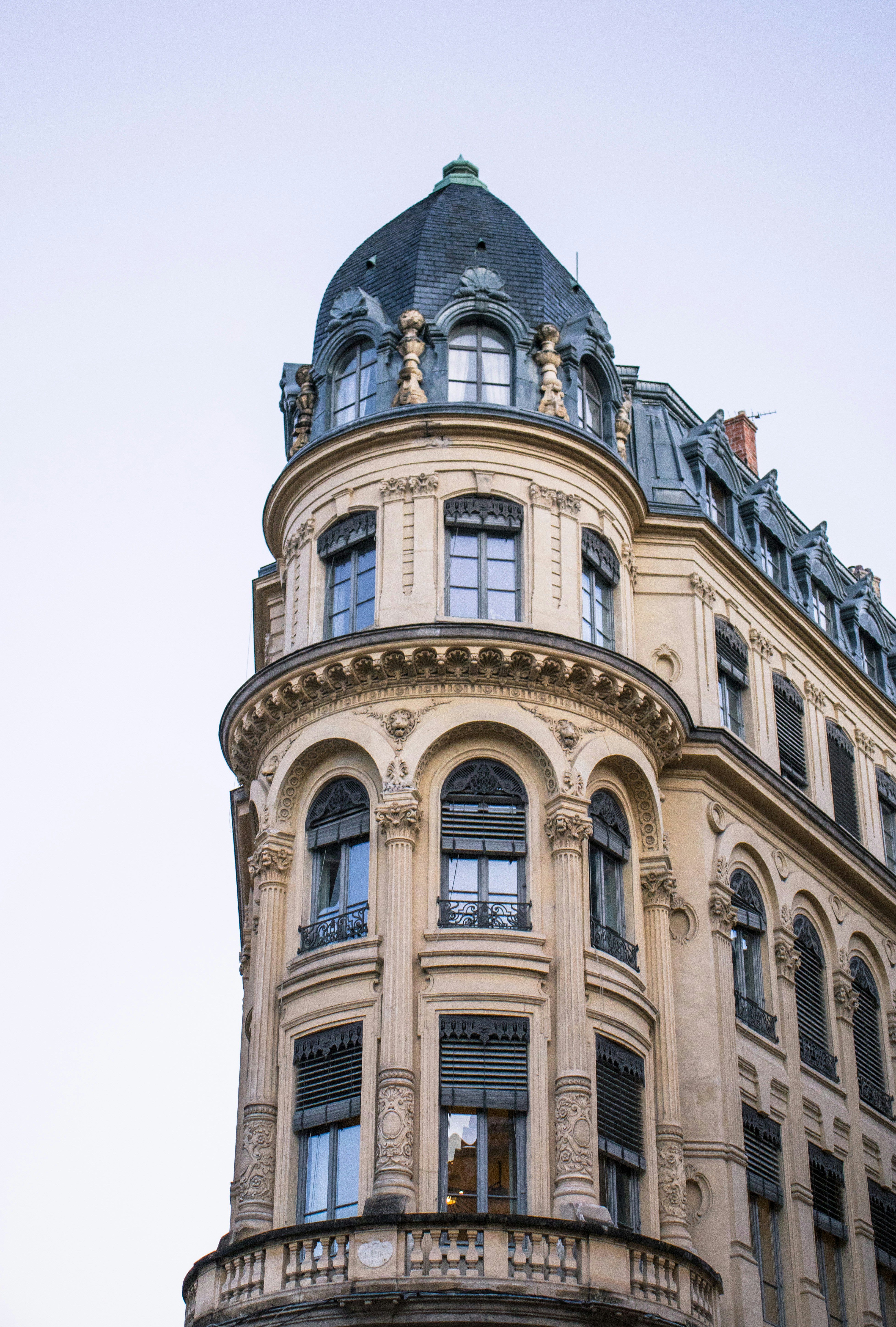 Ornate building with a domed roof against sky