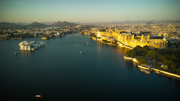 Golden palace buildings on the shore of Lake Pichola