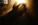 Hand reaching towards bright sunlight with dust particles