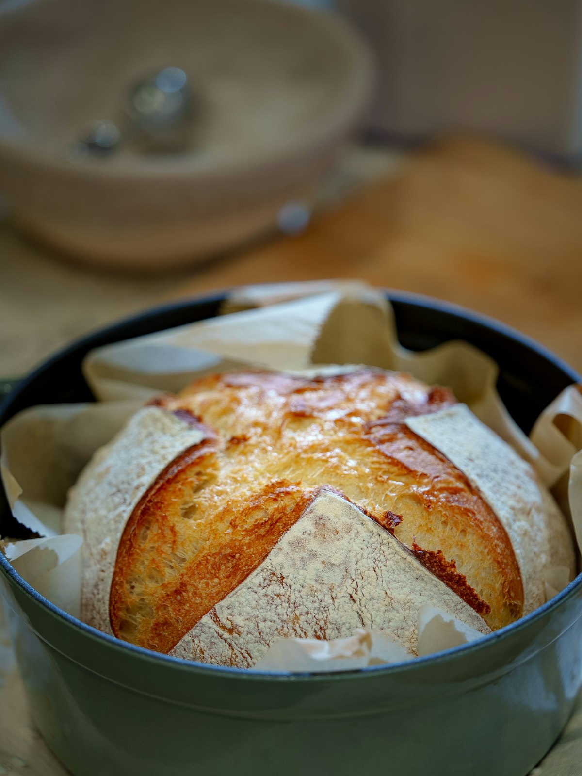 Freshly baked artisan bread in a Dutch oven