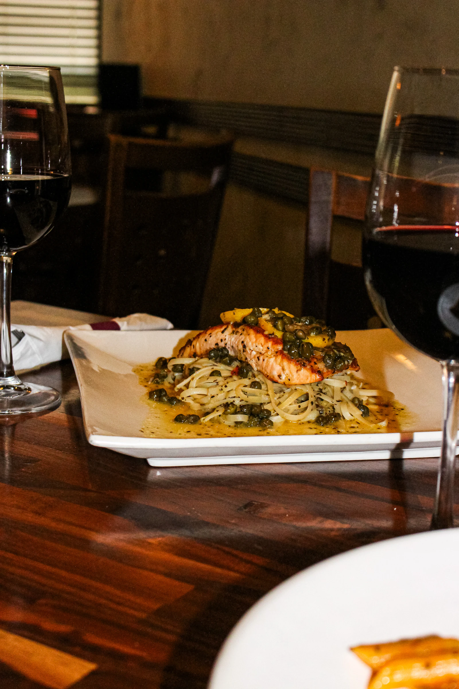 Salmon pasta served at the table