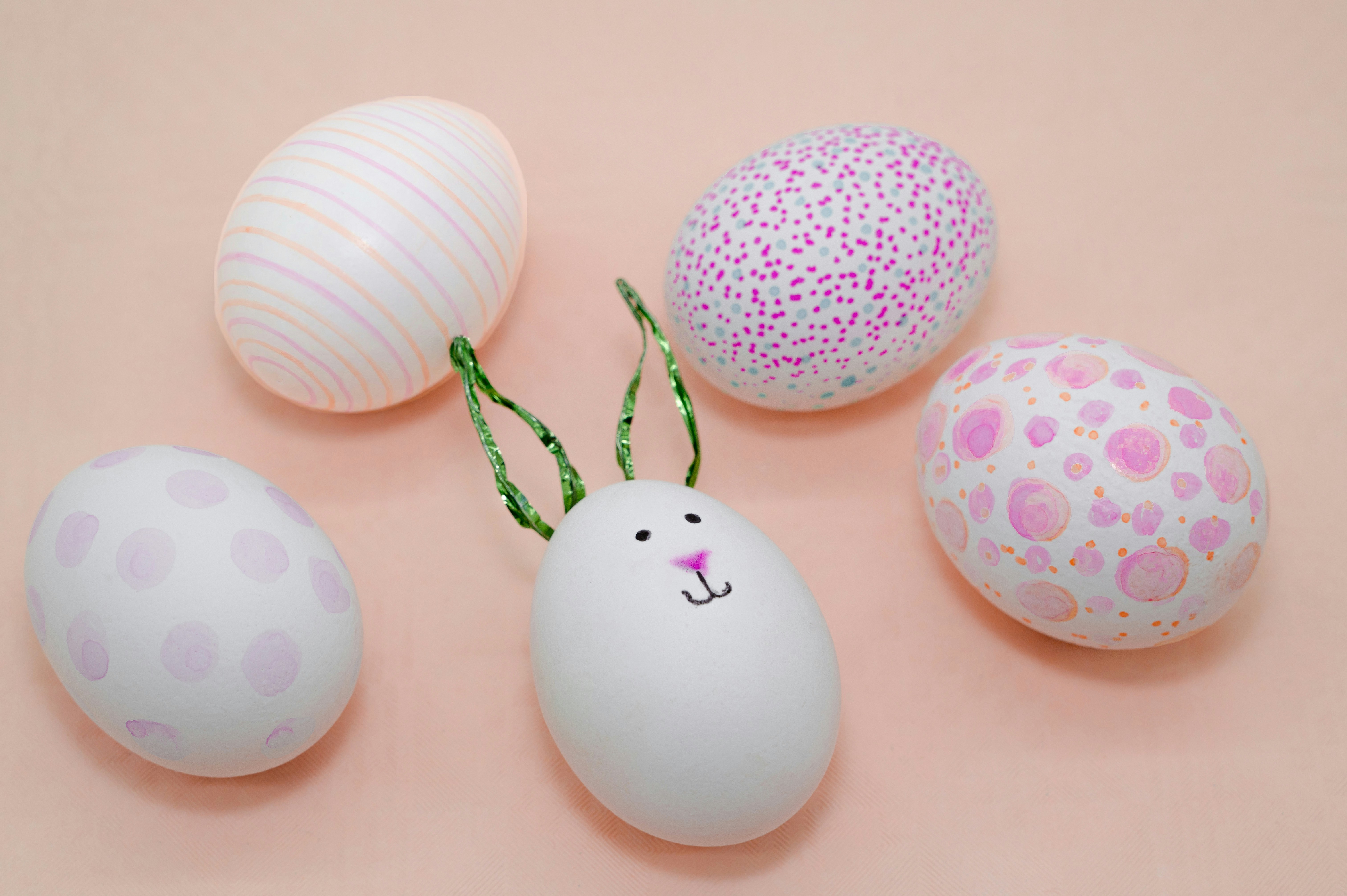 Decorated easter eggs with a bunny egg in the center