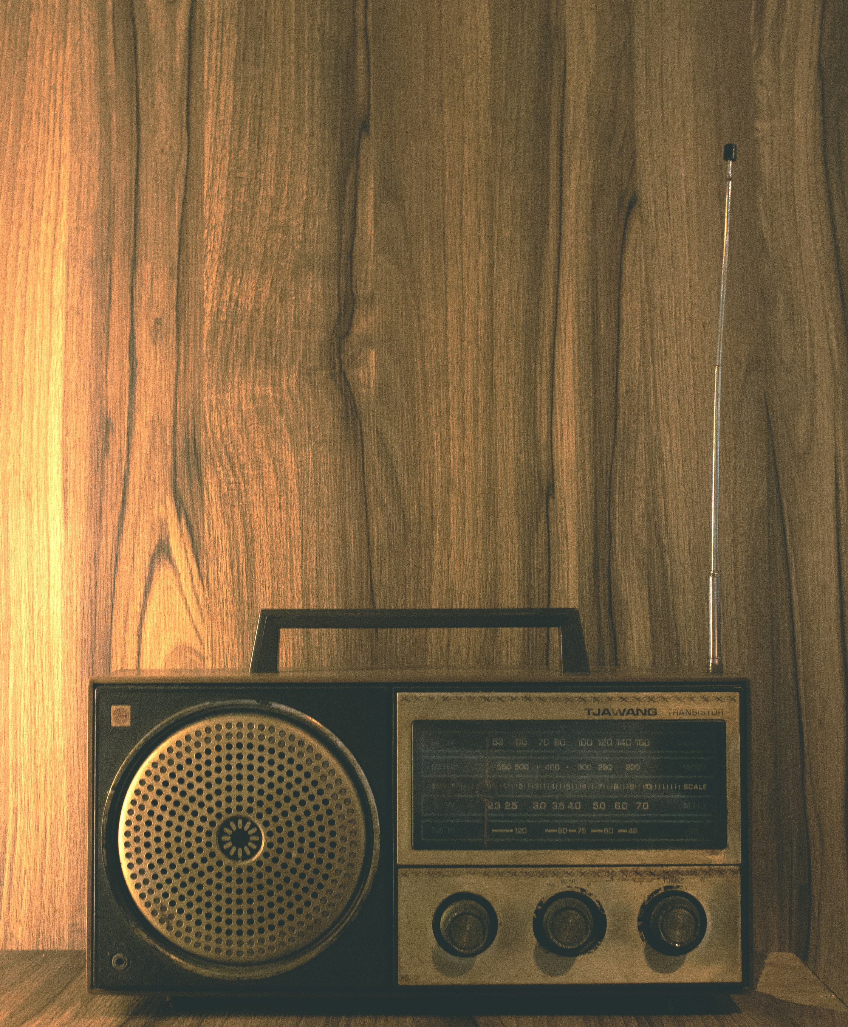 Vintage radio with wooden background