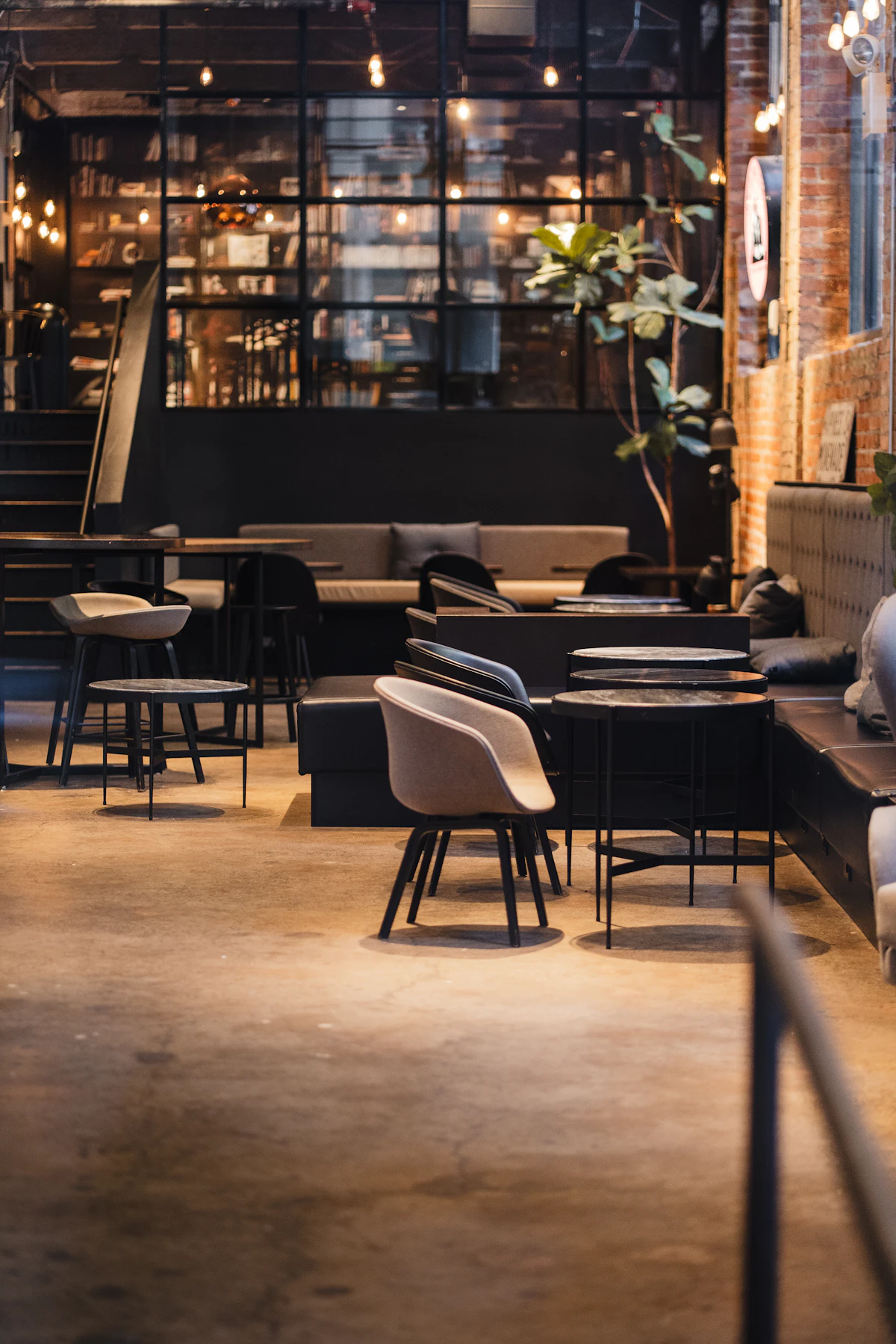 Modern cafe interior with counter seating and tables